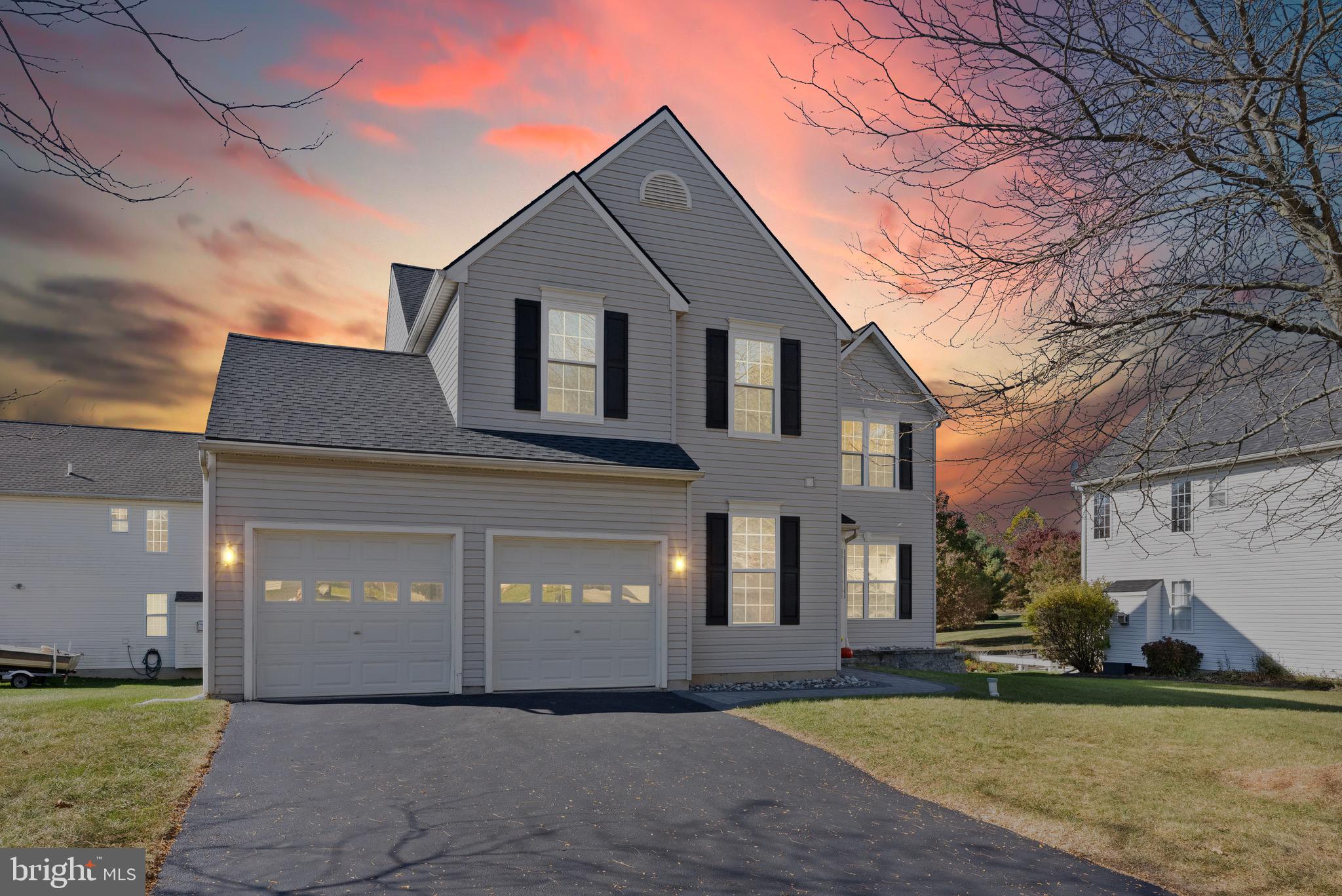 Welcome to 21 North Danbury Circle, a modern sanctuary in Coatesville, PA, offering a blend of style and comfort across 2,796 square feet of living space. This beautifully updated home sits on a desirable corner lot, providing ample space and privacy on a 10,650-square-foot parcel. Step inside to discover the elegance of hardwood floors that flow seamlessly throughout the entire home and new windows that invite an abundance of natural light. The spacious living area features a cozy fireplace, perfect for relaxing evenings or hosting gatherings. The heart of the home is a well-appointed kitchen with brand new Stainless Steal appliances.   A new HVAC was installed in 2024 and even better a brand new hot water heater.  This residence boasts four generously sized bedrooms, each offering comfort and style. The primary suite includes a luxurious walk-in closet which features a custom built closet organization system and an ensuite bathroom for your private retreat. An additional 1.5 bathrooms serve the remaining areas of the home, providing convenience and functionality. The unfinished basement offers endless possibilities for customization, whether you envision a home gym, office, or extra storage space.  The attached garage provides secure parking and additional storage. For outdoor enthusiasts, the property backs up to neighborhood walking trails, offering the perfect opportunity for leisurely strolls. Nearby, a park hosts lively concerts, adding a touch of community charm to your weekends. Don't miss the chance to make this stunning property your new home. Experience modern living at its finest at 21 North Danbury Circle.
