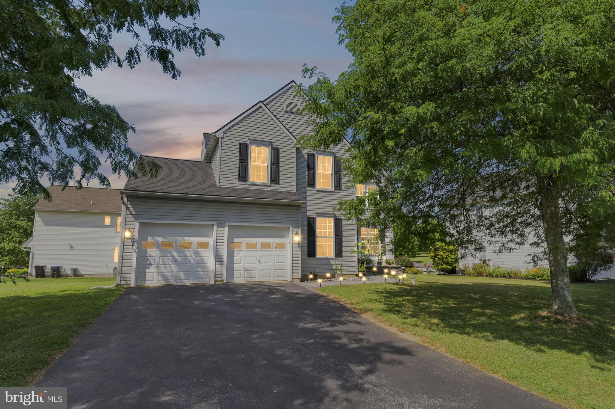 Welcome to 21 North Danbury Circle, a modern sanctuary in Coatesville, PA, offering a blend of style and comfort across 2,796 square feet of living space. This beautifully updated home sits on a desirable corner lot, providing ample space and privacy on a 10,650-square-foot parcel. Step inside to discover the elegance of hardwood floors that flow seamlessly throughout the entire home and new windows that invite an abundance of natural light. The spacious living area features a cozy fireplace, perfect for relaxing evenings or hosting gatherings. The heart of the home is a well-appointed kitchen with brand new Stainless Steal appliances.   A new HVAC was installed in 2024 and even better a brand new hot water heater.  This residence boasts four generously sized bedrooms, each offering comfort and style. The primary suite includes a luxurious walk-in closet which features a custom built closet organization system and an ensuite bathroom for your private retreat. An additional 1.5 bathrooms serve the remaining areas of the home, providing convenience and functionality. The unfinished basement offers endless possibilities for customization, whether you envision a home gym, office, or extra storage space.  The attached garage provides secure parking and additional storage. For outdoor enthusiasts, the property backs up to neighborhood walking trails, offering the perfect opportunity for leisurely strolls. Nearby, a park hosts lively concerts, adding a touch of community charm to your weekends. Don't miss the chance to make this stunning property your new home. Experience modern living at its finest at 21 North Danbury Circle.