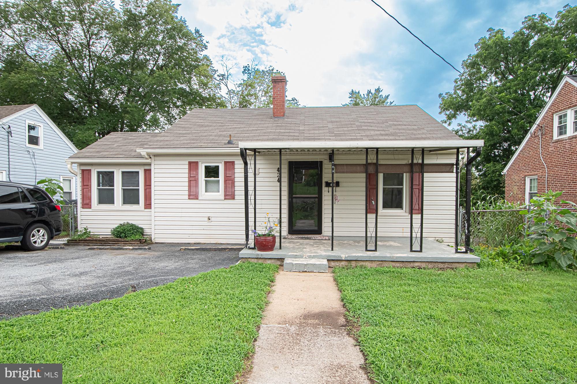 This cozy home offers two bedrooms and one full bath on the main level, along with an updated kitchen, hardwood floors, and a convenient mudroom with a laundry area that includes the washer and dryer.

The finished attic provides a flexible third bedroom or bonus space and features a new mini-split system for efficient heating and cooling.

Recent updates include the HVAC system, hot water heater, and newly installed LeafGuard gutters, providing added value and peace of mind.

Enjoy relaxing on the covered front porch, complete with a pull-down privacy screen, the fenced backyard features a doggie door for added convenience. A partial basement offers excellent storage space, adding even more functionality to this inviting home.

Whether you’re looking for your first home, downsizing, or searching for an investment opportunity, this home offers practical living with several valuable updates.