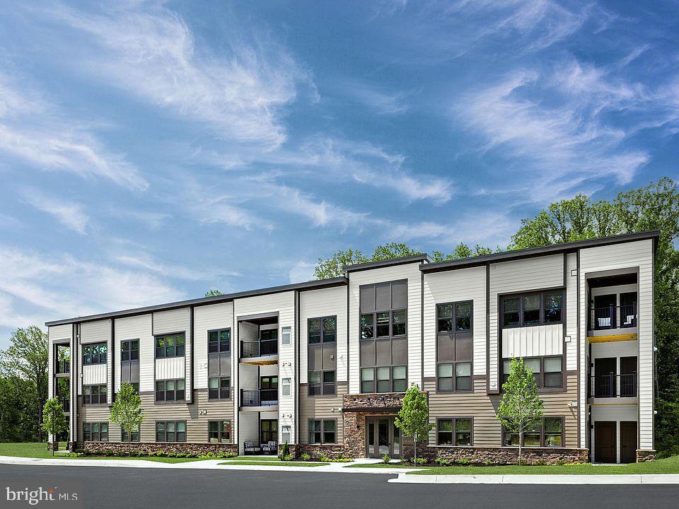 Welcome to 10391 Resort Rd, Unit V — a beautifully constructed 2024 ground-level condo offering modern comfort and serene surroundings. This thoughtfully designed 2-bedroom, 2-bathroom home features 1,069 square feet of well-appointed living space, perfect for both everyday living and relaxing retreats.
Enjoy the ease of ground-floor access combined with a private setting, as the unit faces a peaceful wooded area—providing added privacy and a calming natural backdrop. Inside, you’ll find a bright, open layout with contemporary finishes, spacious bedrooms, and well-designed bathrooms that blend style and functionality.

Whether you're a first-time buyer, downsizing, or seeking low-maintenance living, this nearly new condo offers the perfect balance of convenience, comfort, and tranquility.