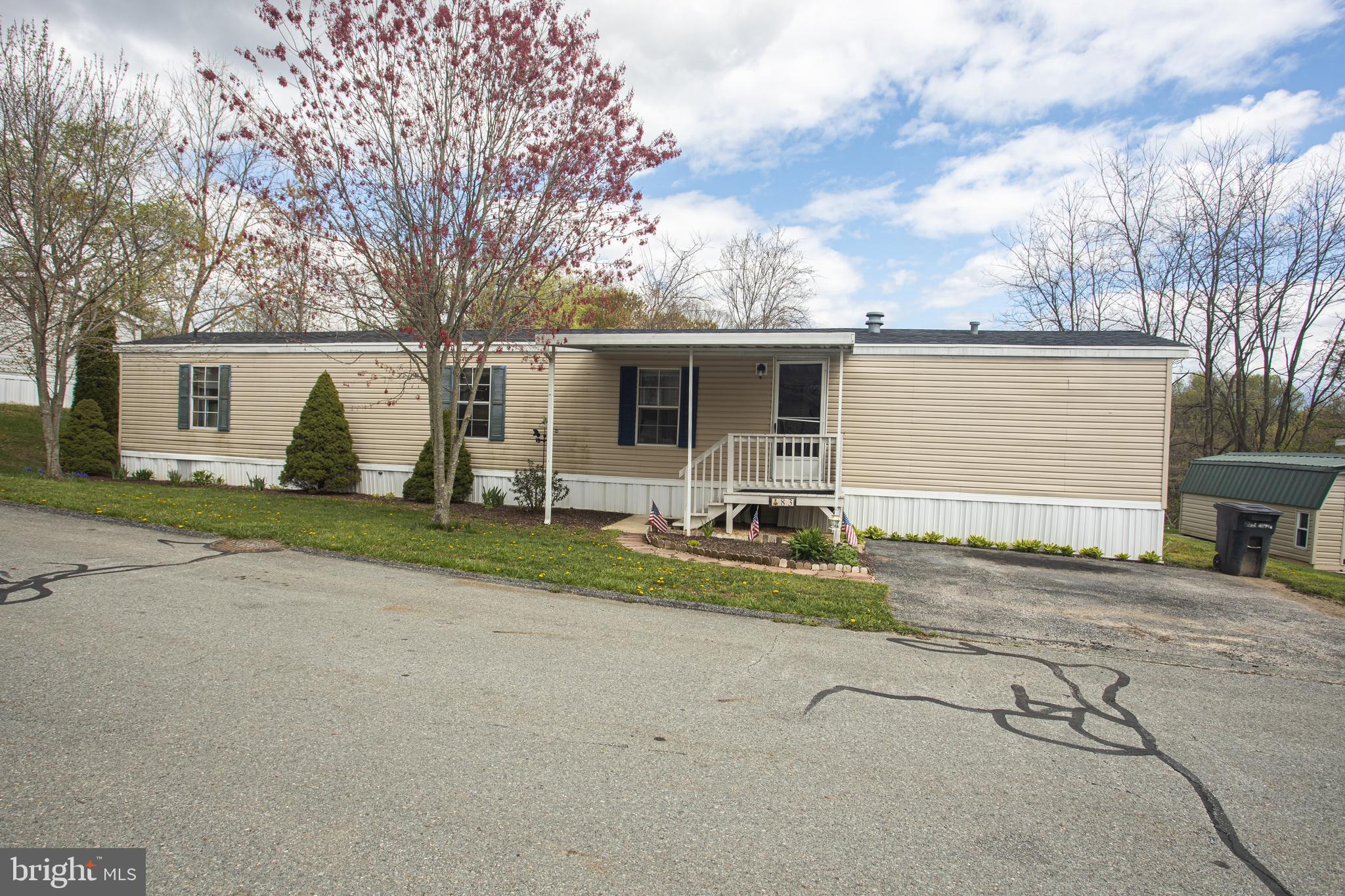This beautiful 2BR, 2 full bath liberty MH is set in Shalako park. Located in Eastern York school district. This MH has a nice open layout with kitchen and living room in the center and a bed and bath at each end. Wood and vinyl floors throughout. Master bathroom has step-in shower and second bathroom has tub/shower with a skylight above. The front has a small covered porch and the tree line it the backyard provides nice privacy for your summer cookouts