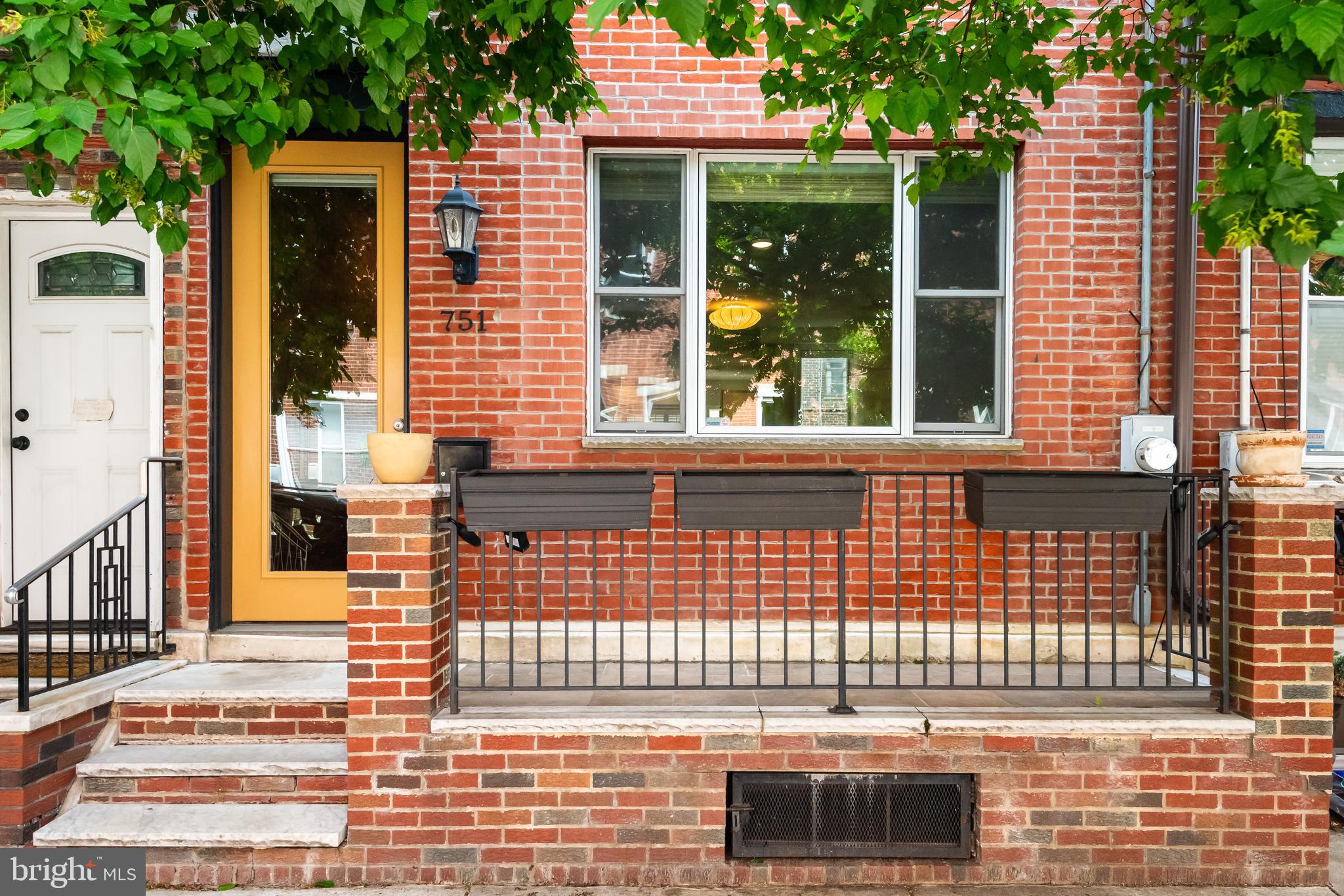 Decide now to buy this beautiful townhome nestled on a quiet one-way street offering the perfect blend of comfort and urban convenience. This lovingly maintained residence features 3-4 bedrooms (4th bedroom is currently in use as a closet and can be converted back to a bedroom), 3 full baths and one powder room. This renovated home is on a quiet street in the coveted Bella Vista neighborhood. Enter the home to 10’ ceilings, rich hardwood flooring adding elegance and warmth to every room, and exposed brick accent walls all contribute to the overall charm of this house. The gourmet kitchen is equipped with peninsula seating, granite counter-tops, designer backsplash tile, SS 6-burner Wolf gas cooktop & hood, sub-zero refrigerator and custom cabinetry. From the kitchen, access the fenced-in patio - great for grilling. Go upstairs to the second level boasting two large bedrooms with many closets and hall bath. The front bedroom on this level features a beautiful updated full bath with a granite topped vanity, walk-in glass surround shower with marble tile and a waterfall shower head. The hall bath is also updated and has a tub along with a stone topped vanity. Keep going upstairs to the main Primary Suite with vaulted ceiling, private access to a roof top deck, a luxurious bath with a granite top double sink and vanity, extra large walk-in shower with a glass enclosure and custom designer tile. The back bedroom has been converted to a large customized closet with entry from the main bathroom or hallway. The closet is ample in size having drawers and hanging space complete with lighting & other custom features. From the main bedroom there is private access to the rooftop deck with great views of the city in all directions. Go down the steps to the lower level with radiant tile floors, powder room, laundry and storage area. This house is perfect for those seeking a dynamic urban lifestyle in a charming renovated home.