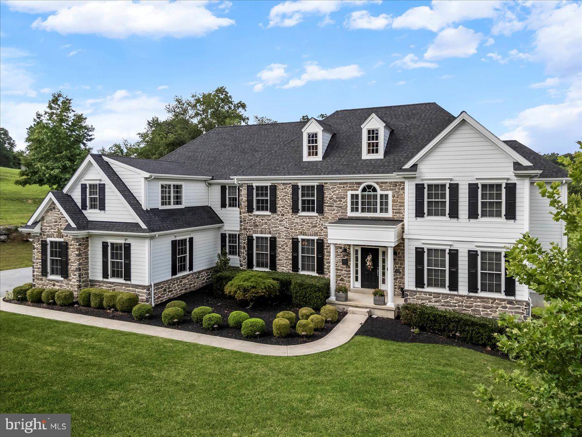 Exquisite Custom Residence at 203 Geist View Circle | Media, PA
5 Bedrooms | 3 Full & 2 Half Baths | 3-Car Garage | Expansive Fenced Lot | Tour-Ready Luxury

Welcome to a spectacular showcase of craftsmanship and elegance nestled in one of Media’s most sought-after enclaves. Situated on a quiet cul-de-sac with tree-lined privacy, this stunning custom colonial is a true masterpiece of design, comfort, and lifestyle — the kind of home that checks every box.

Timeless Exterior & Curb Appeal
From the moment you arrive, you're greeted by rich stonework, black shutters, and charming dormers that elevate the home’s stately facade. The oversized three-car garage, pristine landscaping, and expansive driveway add to the estate-like presence. Out back, enjoy a private, fenced yard with mature trees and a brand new trex deck, complete with gas fireplace, roof covered cozy TV area with built heaters and speakers — ideal for outdoor entertaining or future enhancements like a pool.

Impeccable Interior Highlights
Step inside to be captivated by gleaming hardwood floors, custom millwork, and sun-drenched rooms with soaring ceilings. A dramatic staircase is flanked by bright living spaces, a cozy fireside family room, and a formal dining room with custom molding details.

Gourmet Chef’s Kitchen: A true showstopper, equipped with stainless steel appliances, an oversized island, granite counters, double wall ovens, and walk-in pantry. The kitchen seamlessly connects to the sunlit breakfast area and family room.

Primary Suite Retreat: The tranquil owner’s suite features vaulted ceilings, two walk-in closets, and a spa-worthy bath with dual vanities, soaking tub, and separate glass-enclosed shower.

Flexible Living Spaces: Includes a dedicated office, upper-level window bench nook, and massive unfinished basement ready for all your great ideas!

Elevated Everyday Living
Private Home Gym with luxury vinyl flooring, large mirrors, and natural light.
Bright Laundry Room with high-end washer/dryer, ample storage, and deep utility sink.
Jack-and-Jill Bathrooms with dual sinks and designer tile.
Elegant powder rooms for guests and added convenience.

Location Perfection
Tucked into a serene, upscale community just minutes from the charm of downtown Media, you’ll enjoy access to award-winning Rose Tree Media Schools, proximity to Route 1, and nearby parks and trails.

The Ultimate Turn-Key Home
Whether you're entertaining guests in the gourmet kitchen, enjoying quiet moments on the upper window seat, or working out in your private gym, this home blends sophistication with function — all in a move-in ready package.

Schedule your private showing today and discover why 203 Geist View Circle is the rare gem you've been waiting for.