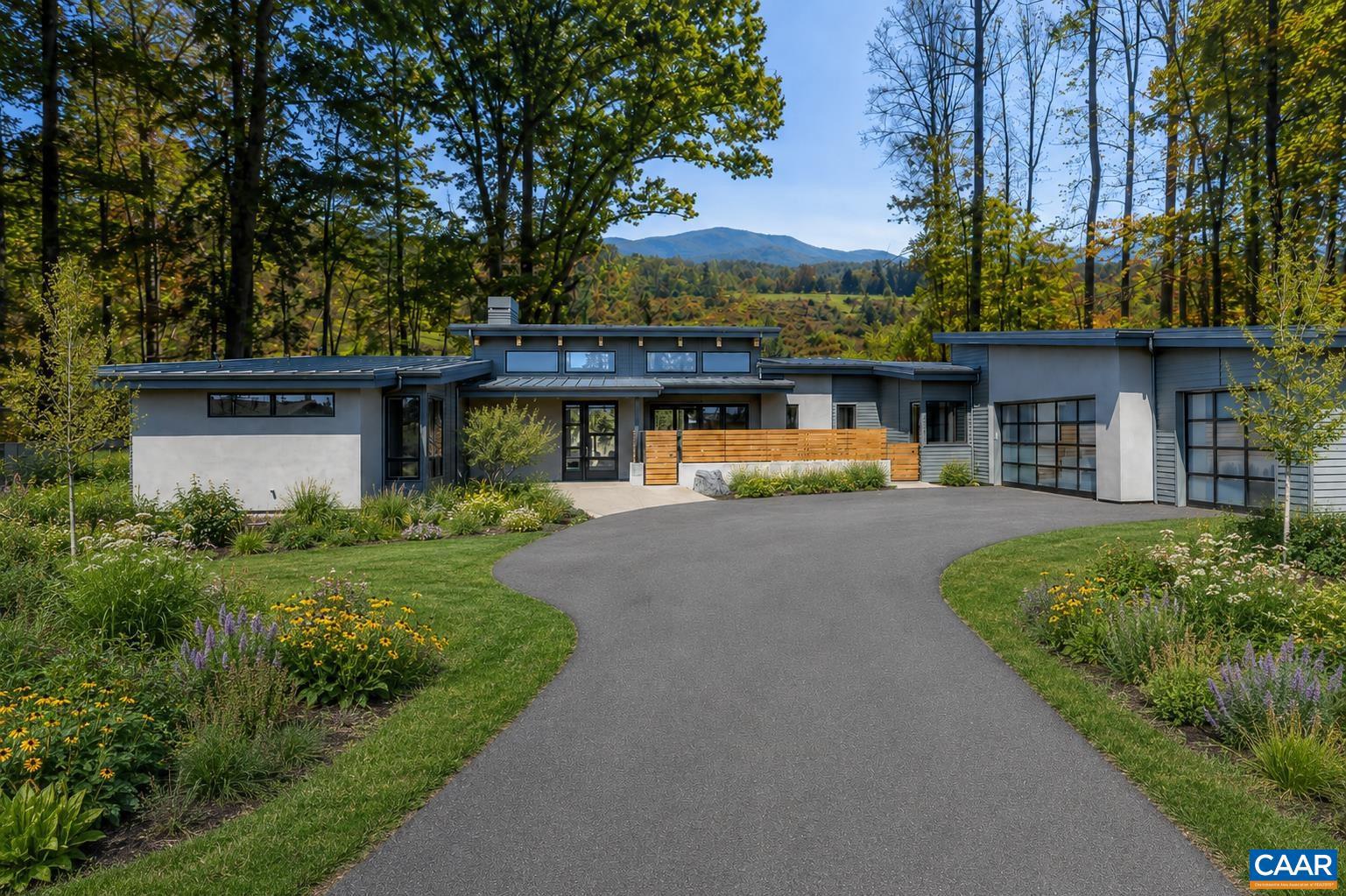 Some of the best views you will find in Western Albemarle.  The Ridgeway plan is a contemporary dream home with soaring ceilings and lots of windows to take in the fantastic views this property features.  The home has multiple outdoor living areas, separate game room and a 3-car garage.  Travel down a long-wooded driveway to arrive at this private oasis in the woods.  Images are from stock plans purchased by the builder.  Buyers can customize their finishes base on their preferences.,Granite Counter,Maple Cabinets,Fireplace in Great Room