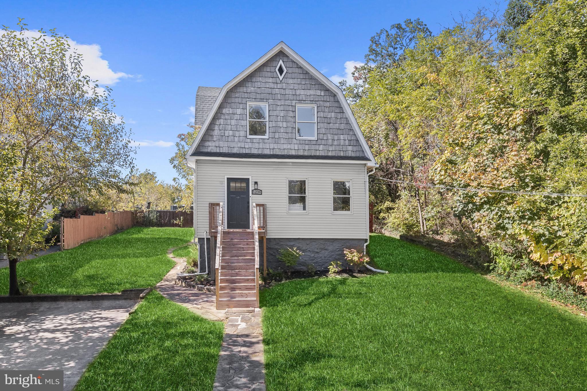 Welcome to this charming, Colonial single-family residence nestled in the heart of Baltimore, Maryland. This delightful east-facing home boasts a combination of shingle and vinyl siding, making it both attractive and low maintenance.  Step inside to discover a main-level open floor plan that offers a seamless dining and living room combination. Natural light pours in through the beautiful bay window, illuminating the gleaming hardwood floors and elegant chair railing. Perfect for entertaining or simply relaxing with loved ones, this spacious area invites warmth and comfort into your daily routine.  The eat-in kitchen features a convenient breakfast bar, stainless steel appliances, and stunning quartz counters. The exposed beam and beadboard ceiling add an element of rustic charm, creating a cozy atmosphere to share meals and memories.  Retreat to the upper level where two sizable bedrooms await, adorned with plush carpeting and a hall bath boasting a double vanity and a luxurious soaking tub. The partially finished lower level offers endless possibilities, whether you envision a media room, guest suite, or a private haven for family and friends, complete with a full bath and a subway tile walk-in shower.  Embrace outdoor living on the rear deck, surrounded by beautifully landscaped grounds. The two-car driveway ensures ample parking, while the main level powder room and generous storage throughout the home cater to all of your practical needs.  Don't miss the opportunity to call this enchanting property your forever home – schedule a private tour today and experience the magic for yourself. Major commuter routes include I-95, US-1, and I-695 for easy travel to points north and south.
