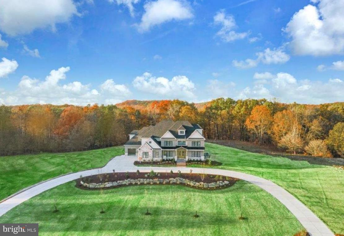 Oakwood by Eddy Homes – A Once-in-a-Lifetime Opportunity

Set within the coveted Unionville–Chadds Ford School District—just minutes from the everyday conveniences you desire, this custom home sits on a 3.2-acre private estate offering both serenity and accessibility.

Step into this luxurious custom home through a grand foyer with soaring ceilings, leading to a great room featuring a majestic stone fireplace & expansive window wall that frames breathtaking views of your 3.2-acre estate. Entertain in style with a formal dining room and private study, while the chef’s kitchen, a masterpiece of design, dazzles with dual 10’ islands, quartz countertops, butler’s pantry & upscale finishes that elevate everyday living.

Owner’s suite is an unparalleled retreat, offering a private balcony, 2 oversized closets & spa-inspired bathroom with premium design. Upstairs secondary bedrooms are thoughtfully designed with ample closet space, while the finished 3rd floor provides an elegant private suite. A 3-car side-entry garage and spacious mudroom ensure everyday convenience.

The walkout basement boasts a bedroom, full bath & a theater room, with direct access to the outdoors. Step outside to an expansive deck and wooded backdrop—perfect for both quiet mornings and lively gatherings.

Located just minutes from West Chester and Concordville, enjoy boutique shopping, top-rated dining, and year-round community events. With easy access to Route 202 and I-95, you’re a quick drive to Wilmington, DE, and only 30 miles from Center City Philadelphia. Nearby attractions include Longwood Gardens, local wineries, and premier golf courses.

Don’t miss this extraordinary opportunity. Schedule your private site tour today and claim your dream before it’s gone! This is your last chance to own a custom Eddy Home in Oakwood—where exclusivity meets natural beauty.