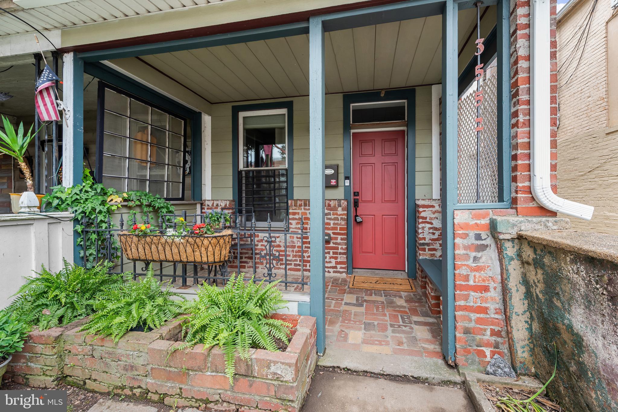 Warm, welcoming, and full of charm, this beautifully maintained Hampden home offers the perfect blend of character, comfort, and convenience — all just steps from The Avenue. From the inviting front porch to the thoughtfully updated interior, every space feels designed to make you feel right at home.

Step inside to an open and sun-filled main level featuring a spacious living room, dining area, gourmet kitchen, and convenient half bath. Natural light pours throughout the home, creating a bright and airy feel that is both cozy and welcoming.

Upstairs, you’ll find two generously sized bedrooms and two beautifully updated full bathrooms. The primary suite features an en suite bath with a double vanity, creating a peaceful and functional retreat, along with a private rear deck perfect for enjoying your morning coffee or unwinding at the end of the day. A second-floor washer and dryer — just six months old — adds everyday convenience right where you need it most.

Additional updates include a new roof installed in 2022, offering peace of mind for years to come. Rounding out this exceptional home is the rare luxury of off-street parking for two cars on the spacious rear parking pad — an incredible bonus in the heart of Hampden.