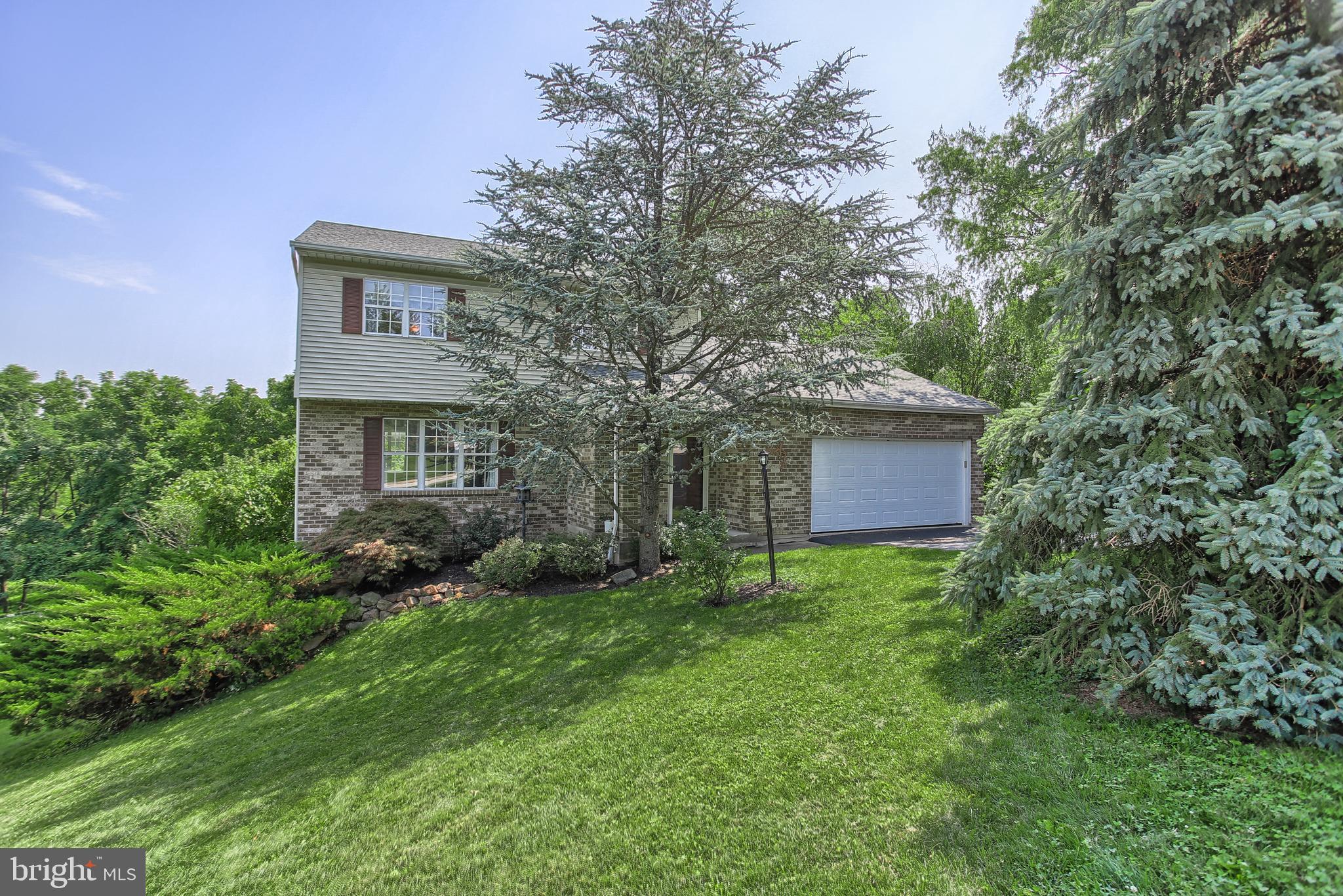 Well maintained 2-story home in Central School District.  As you enter the front door of this 3BR, 2.5 BA home you will experience the spacious unique foyer.  This beauty offers a gorgeous remodeled kitchen, family room with gas fireplace (antique mantle), 2 car garage with service door, Mannington laminate flooring, walk-out basement, deck, patio, inground pool, all surrounded by nature and wonderful landscaping.  If that isn't enough, it is also conveniently located to shopping, restaurants, parks, and major highways.
