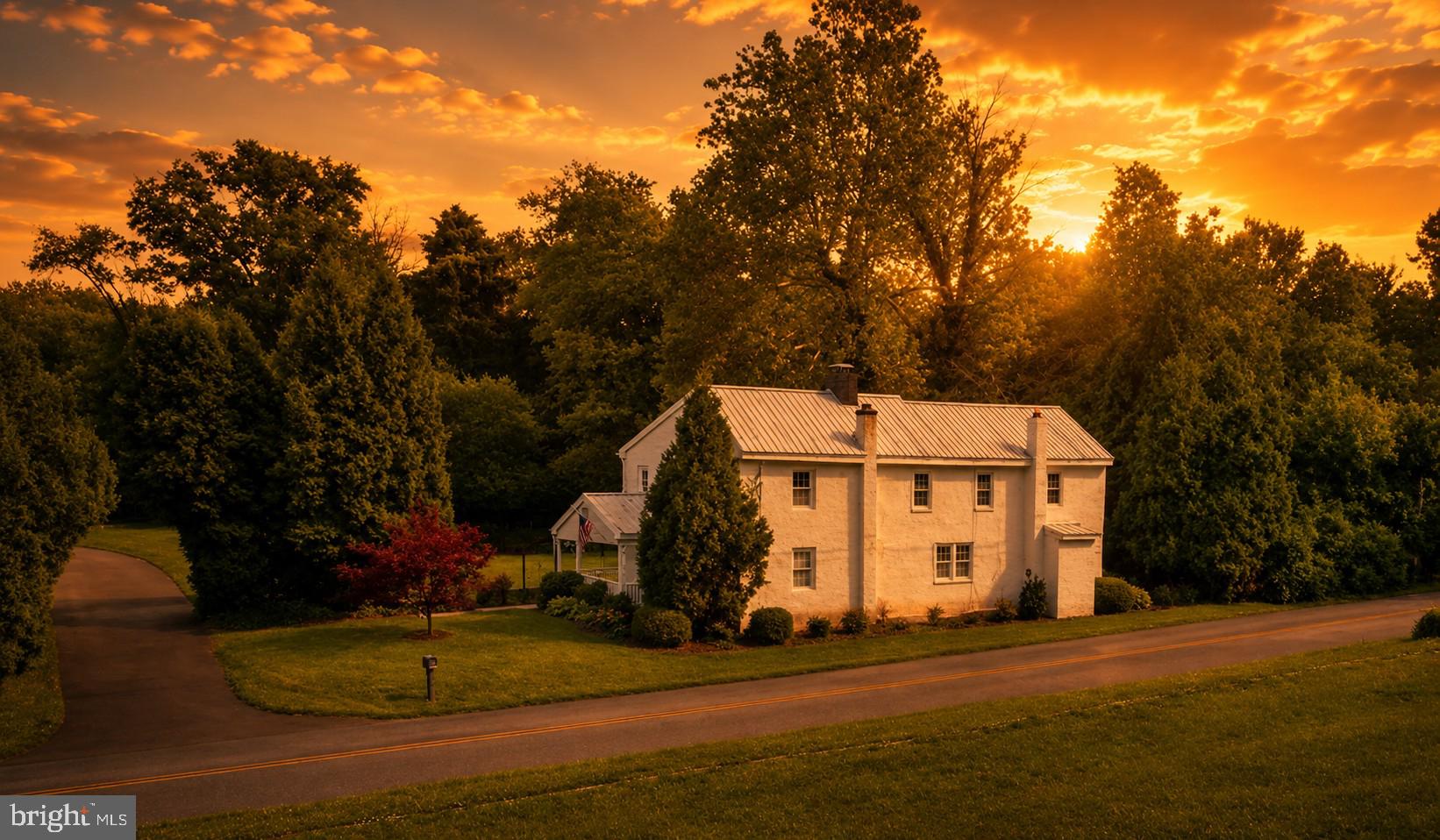 Welcome to 443 Baptist Church Road! Quintessential Chester County charm meets
peaceful country living in this character-filled farmhouse dating back to the 1870s. Set
on a quiet and mostly flat 1.7-acre lot in East Coventry Township and within the highly
regarded Owen J. Roberts School District, this 3-bedroom, 1.5-bath home offers over
2,000 square feet of living space filled with warmth, history, and practicality.
Enter from the driveway into the country-style galley kitchen featuring knotty pine
cabinetry, butcher block countertops, double sink, and charming custom touches like an
ornate microwave nook and live-edge slab shelving. Just off the kitchen are a
convenient first-floor powder room and an oversized laundry/mechanical room.
The formal dining room is rich with farmhouse character, complete with hardwood floors,
a built-in hutch, and a fireplace with wood stove insert, fieldstone surround, and slate
hearth. From here, step out onto the covered porch - the perfect spot for morning
coffee, letting the dogs out, or relaxing while listening to a summer rainstorm.
Just beyond the dining room is the living room, located in the original and oldest section
of the home. Deep windowsills, impressive 3-foot plaster walls, and a large wood/coal
stove create an incredibly cozy atmosphere and showcase the home’s historic roots.
Upstairs, the spacious primary bedroom sits just at the top of the stairs. The full hall
bath features full tile walls, ceramic vanity, and a tub/shower with tile surround. The
second and third bedrooms are generously sized and connected in tandem style, true to
the home’s period design. The current owners have also created a peaceful sitting area
on the second-floor landing area, an ideal place to overlook the backyard and enjoy the
abundance of wildlife and birds that frequent the property.
Outside, the property continues to shine with 3 large sheds, a substantial horse barn,
fenced yard space, and plenty of room to spread out and enjoy country living. Mature
landscaping includes peach, pear, and fig trees, along with open grassy areas ideal for
gardening, entertaining, animals, or simply enjoying the outdoors.
Low taxes, timeless 1800s farmhouse charm, a highly desirable school district, and
nearly two acres of usable land make this a rare opportunity you won’t want to miss.
Schedule your private tour today!
Please note: There is currently an active honeybee hive on the property used for honey
production. Buyers and agents with bee allergies or sensitivities should exercise caution
while touring the property. The hive and bees will NOT convey with the sale and will be
professionally relocated prior to settlement. One storage shed containing sterile
beekeeping equipment and supplies will remain locked during showings to protect hive

health and prevent contamination. Access may be arranged for seriously interested
buyers.