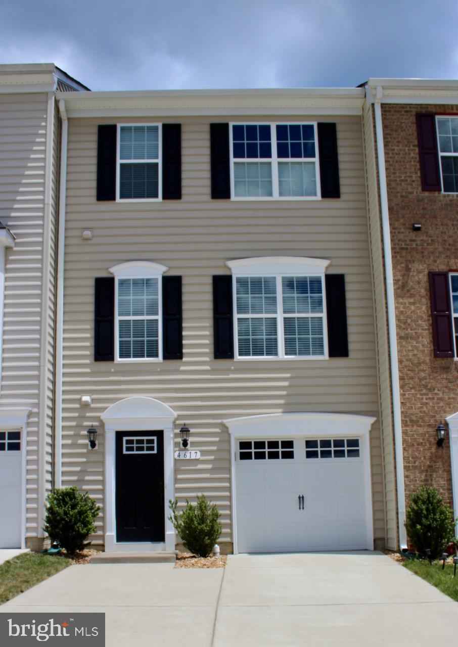 PRISTINE & Impeccably maintained 3 bedroom , 2.5 bath townhome offered in the Townhomes at Lakeside community. 
Beautiful, move in ready, 1- Owner home offers hardwood floors on main level & granite kitchen with an oversized island, backs to green space galore!
Ground level offers a 1 car - FINISHED garage, with attached overhead hanging shelf for storage; ground level entrance greets you with spacious coat / storage closet & a roughed in powder room ready for your finishing touches. The finished, lower level rec room completes the ground level space. Just outside the rec room you will find a gorgeous exterior brick paver patio for your outdoor gatherings.
The Main level Kitchen, Dining Area & Living Room are the epitome of the open concept. Very spacious & inviting! The kitchen boasts a 8'  long island & a convenient powder room can be found off the living room area. Off the the kitchen you will find the fabulous SCREENED-IN porch addition. Totally screened in on all 3 sides AND underneath the deck - this area creates a lovely & relaxing environment to enjoy your unobstructed green - space views. 
3rd floor living space offers the Owner's Suite  with vaulted ceiling, walk in closet & private full bath.   A shared full bath services 2 other bedrooms, both of which do have water views. Lastly the laundry closet can be found at the upper hallway- furnished with newer appliances which will remain with the home.
Newly Built in 2016 , this townhome is minutes away from the Fredericksburg VRE & I95 & RT 1. Convenient shopping & amenities can be found in any direction within minutes as well as historic downtown Fredericksburg. 
Community Amenities include a peaceful, maintained walking trail beside the lake; low HOA fees, snow removal, playground & ample visitor parking just steps away from the townhome! You will fall in love at first sight , Hurry   This home wont last long!