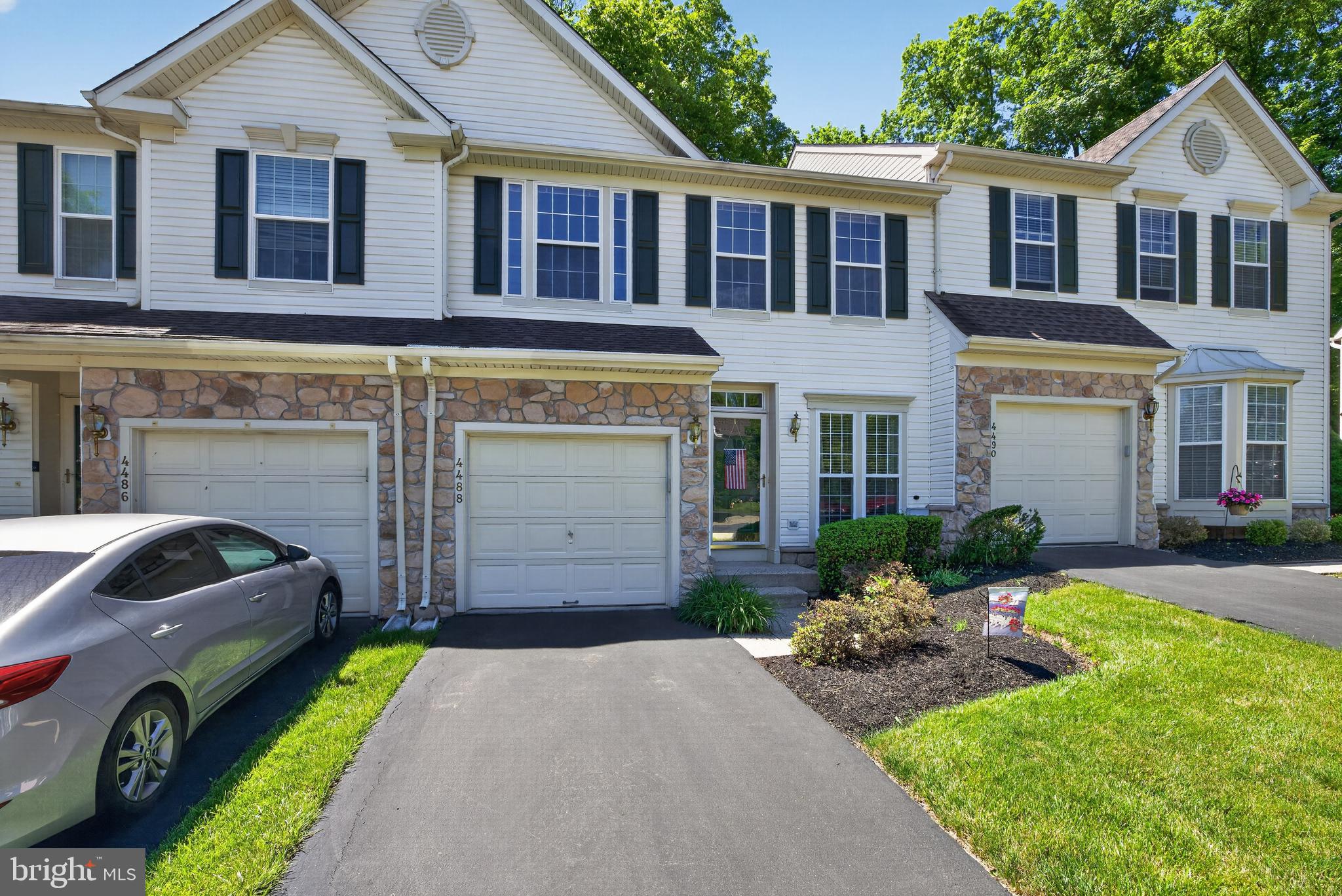 Welcome to 4488 Honeysuckle Lane, a beautifully maintained townhome located in the highly desirable Summer Meadow community of Plumstead Township. Offering 3 bedrooms, 2.5 baths, and an open-concept layout, this home combines comfort, style, and functionality. 

Step inside to find 9-foot ceilings, newly refinished hardwood floors, and abundant natural light throughout the main level. The inviting living and dining areas provide the perfect setting for everyday living and entertaining. The well-appointed kitchen features granite countertops, stainless steel appliances, a pantry, ample cabinet space, and a sunny breakfast area overlooking the spacious Trex deck—ideal for outdoor dining, relaxing, or hosting guests. The adjacent family room is highlighted by a cozy gas fireplace, creating a warm and welcoming gathering space. A powder room and interior access to the one-car garage complete the first floor. 

Upstairs, the spacious primary suite offers a large walk-in closet and a private bath with double vanities, a jetted soaking tub, and a glass-enclosed shower. Two additional generously sized bedrooms share a full hall bath, while the convenient second-floor laundry room adds everyday ease. 

The finished lower level provides flexible living space perfect for a home office, media room, fitness area, playroom, or guest retreat. An unfinished storage area offers plenty of room for seasonal items and organization. 

With thoughtful updates, versatile living spaces, and a prime location within the award-winning Central Bucks School District, this move-in ready home is one you won't want to miss. Schedule your private showing today!