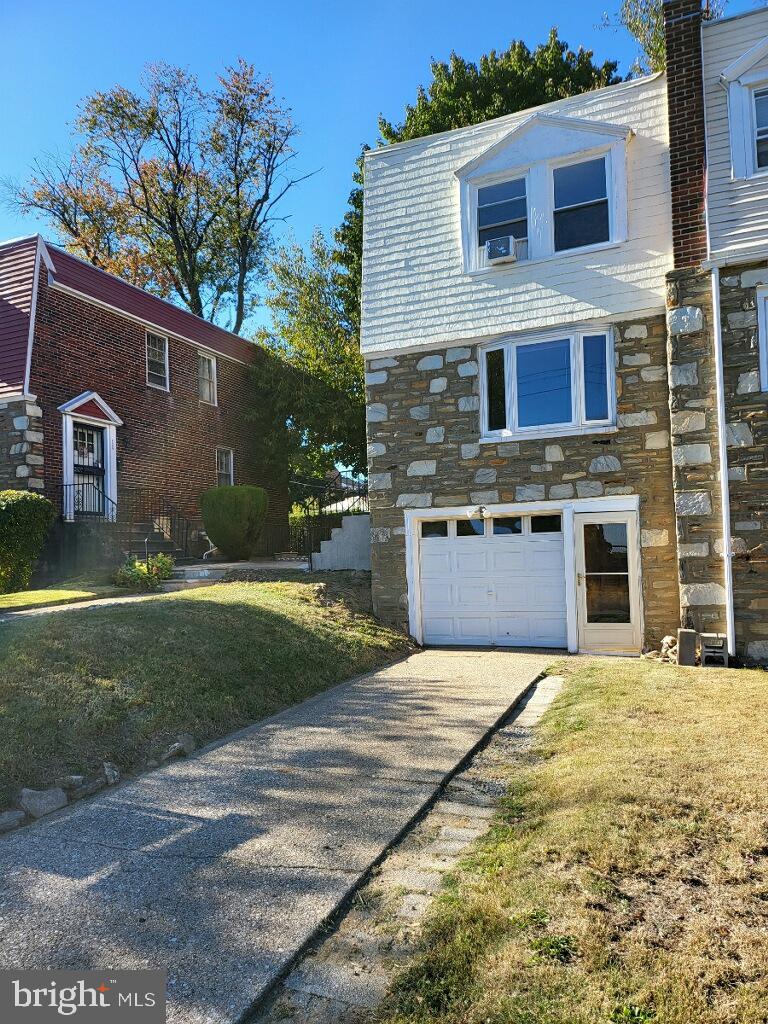 Welcome to this beautifully refreshed Mt. Airy twin home, where abundant natural light and gleaming hardwood floors create an inviting atmosphere. The spacious living room features a lovely bay window, while the updated kitchen offers sleek finishes, a dishwasher, garbage disposal, stove, and pantry for added convenience. Upstairs, find three bright bedrooms and a modern bathroom. A staircase leads to a semi-finished basement, equipped with a washer, dryer, and direct access to the one-car garage and a charming, open backyard—perfect for entertaining, gardening, or relaxing. With freshly painted interiors, gas heat, and a prime location near the Cheltenham Shopping District, schools, and public transportation, this home is the ideal blend of comfort, style, and accessibility. Don’t miss out on this must-see property!