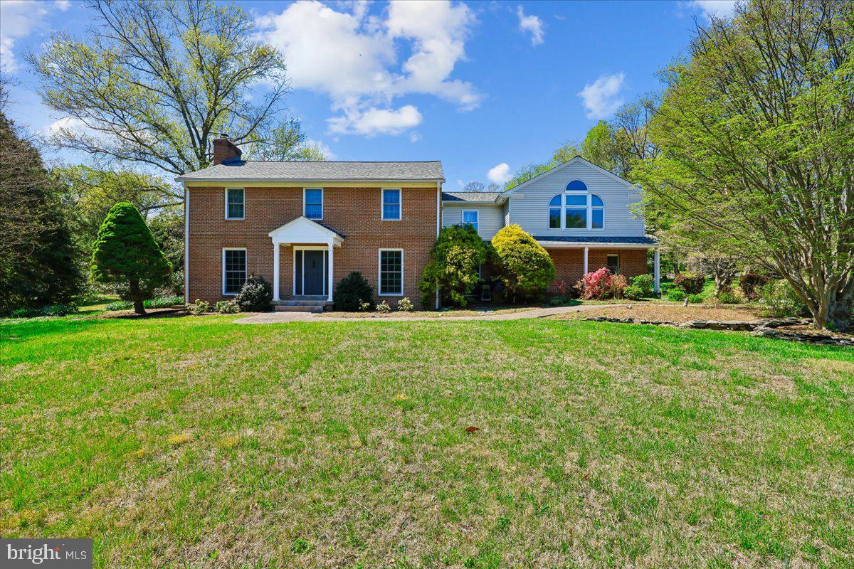 Set on over 2 acres of beautifully landscaped grounds in the heart of Darnestown, this exceptional 5-bedroom, 5-bath residence offers over 5,190 square feet of thoughtfully designed living space — rare scale, privacy, and quality in one of Montgomery County's most coveted communities.
Minutes from Seneca Creek State Park and its miles of trails, yet with easy access to I-270 and the shops and dining of Quince Orchard, the location strikes a balance that's genuinely hard to find. Zoned for Darnestown Elementary / Lakelands Park Middle / Northwest High, families gain access to Montgomery County's highly regarded public schools without sacrificing the elbow room and serenity that define this neighborhood.
The home itself has been substantially expanded and upgraded. At its center is a chef's kitchen with abundant custom cabinetry, granite countertops, premium stainless appliances, double wall ovens, and an oversized breakfast bar — all open to a spectacular great room addition with floor-to-ceiling windows, skylights, automatic blinds, and a gas fireplace. This sun-drenched space frames sweeping backyard views and comfortably accommodates both everyday living and large-scale entertaining.
The upper-level owner's suite, part of the thoughtfully designed addition, is a true retreat: custom built-ins, dual walk-in closets, and a spa bath with soaking tub and separate steam shower. Heated floors grace three bathrooms throughout the home. Hardwood floors and a private home office anchor the main level.
The fully finished lower level adds significant versatility — a large recreation room with wood stove, a brand-new full bath, a flexible bonus room ideal as a gym or guest suite, and a dedicated workshop.
For the buyer thinking long-term, the mechanical profile is equally impressive: geothermal two-zone HVAC with backup (among the most energy-efficient systems available), a new roof, new windows, and a three-car side-load garage. Outdoors, a large shed and dedicated vegetable garden round out a property that's as functional as it is beautiful.
Homes at this size, quality level, and price point rarely become available in Darnestown. This is not a compromise — it's a destination.