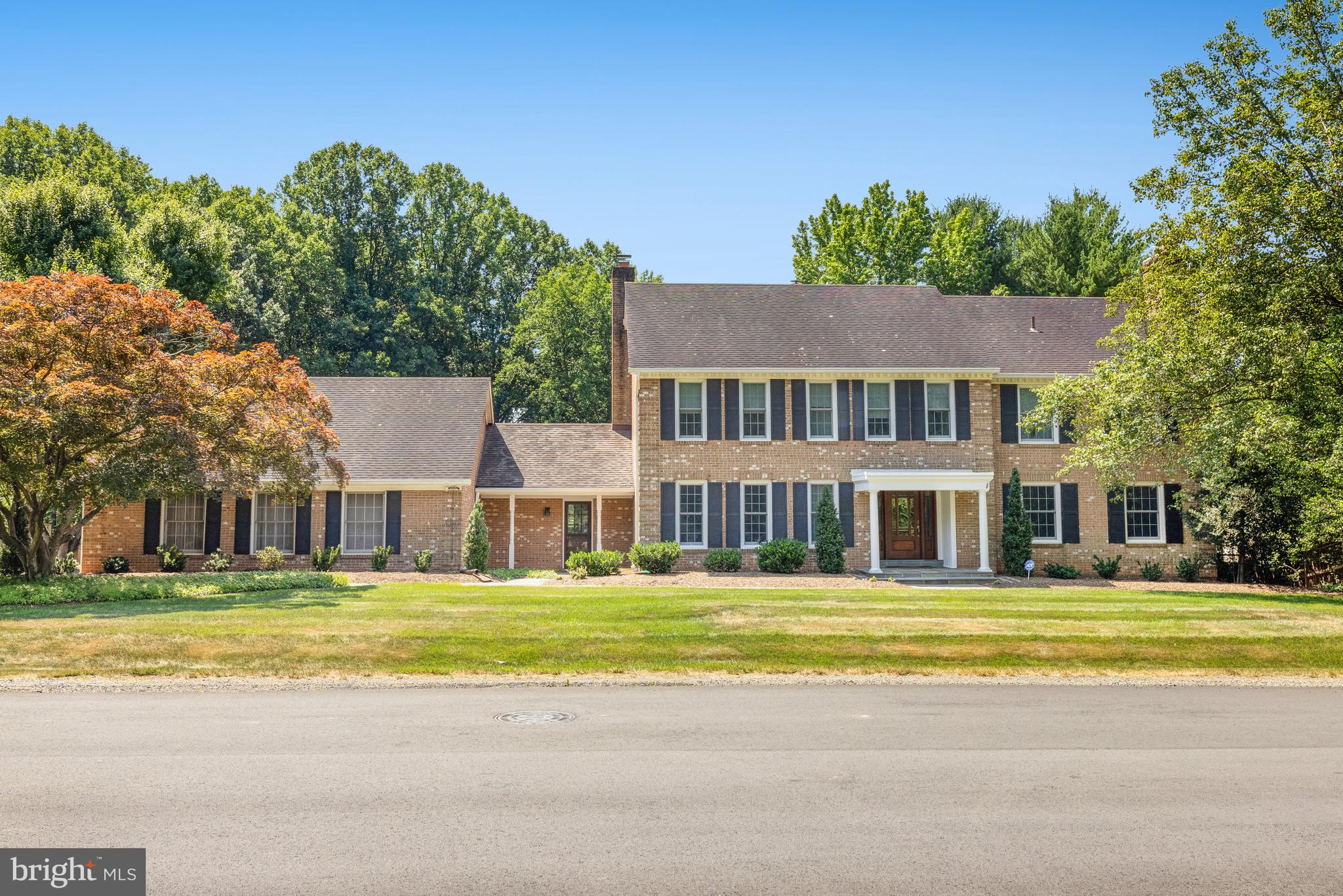 Welcome to this inviting classic colonial home offering 5-bedroom, 4.5-bathroom on 1.3 acres and boasting three beautifully finished levels. Gleaming hardwood floors grace the main level, setting a tone of elegance and warmth throughout. The spacious living areas include two cozy wood-burning fireplaces, perfect for gatherings in the living room and family room. The heart of this home is a large screened-in veranda that spans the entire back side, offering a serene space to enjoy the picturesque backyard, which backs to a lush, wooded area. This outdoor oasis features a sparkling inground swimming pool, providing the ideal spot for relaxation and entertainment. Convenience is key with a side-load three-car garage and a prime location near Tysons, Route 7, and Wolf Trap. This home offers an incredible opportunity to create your dream living space in a sought-after neighborhood. Come and see the potential that awaits in this charming and versatile property.