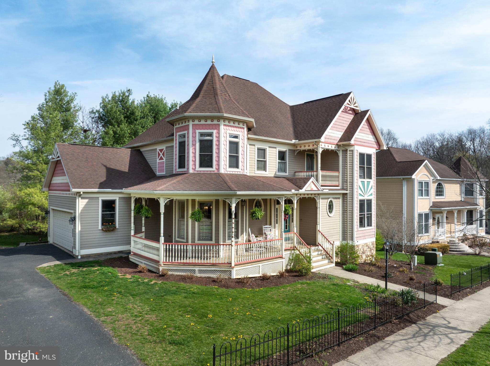 This picturesque Victorian home is ready to welcome its next owner! A rare blend of timeless architecture and an updated interior greet you at every turn. This three bedroom, 2.5 bath property showcases stunning exterior features such as a wrap-around porch, a screened-in back porch and a charming balcony. The details continue as you make your way inside the two-story foyer to see the grand staircase, cheerful wall paper and elegant French doors leading you into the sunny eat-in kitchen. Just beyond the kitchen you’ll find easy access to the laundry room and two car garage, making unloading groceries an almost effortless task. Mix up a fun drink or coffee at the wet bar and imagine overlooking the mature trees in the backyard from the privacy of your screened in porch. Head back inside to the large living room with multiple built-in cabinets, a cozy gas-burning fireplace and gorgeous hardwood floors. With crown molding and 9’ ceilings throughout the level, the floorplan feels both grand and inviting. A powder room, office space with fantastic built-in shelving and pocket doors and a well-sized dining room round out the first level. 

Upstairs, the spacious primary suite delivers a window lined alcove, hardwood floors, a large closet and great tiled bathroom with shower, tub and double bowl vanity. Two other large bedrooms and a full bath complete the second story, along with access to the delightful covered porch out front!

The walkout basement awaits your finishing touch, already radon mitigated and with a built in work bench. Delight in this home where functionality and charm intersect; all moments from the village of Lemont, the Mount Nittany hiking trail and Penn State University. Schedule your private tour today!