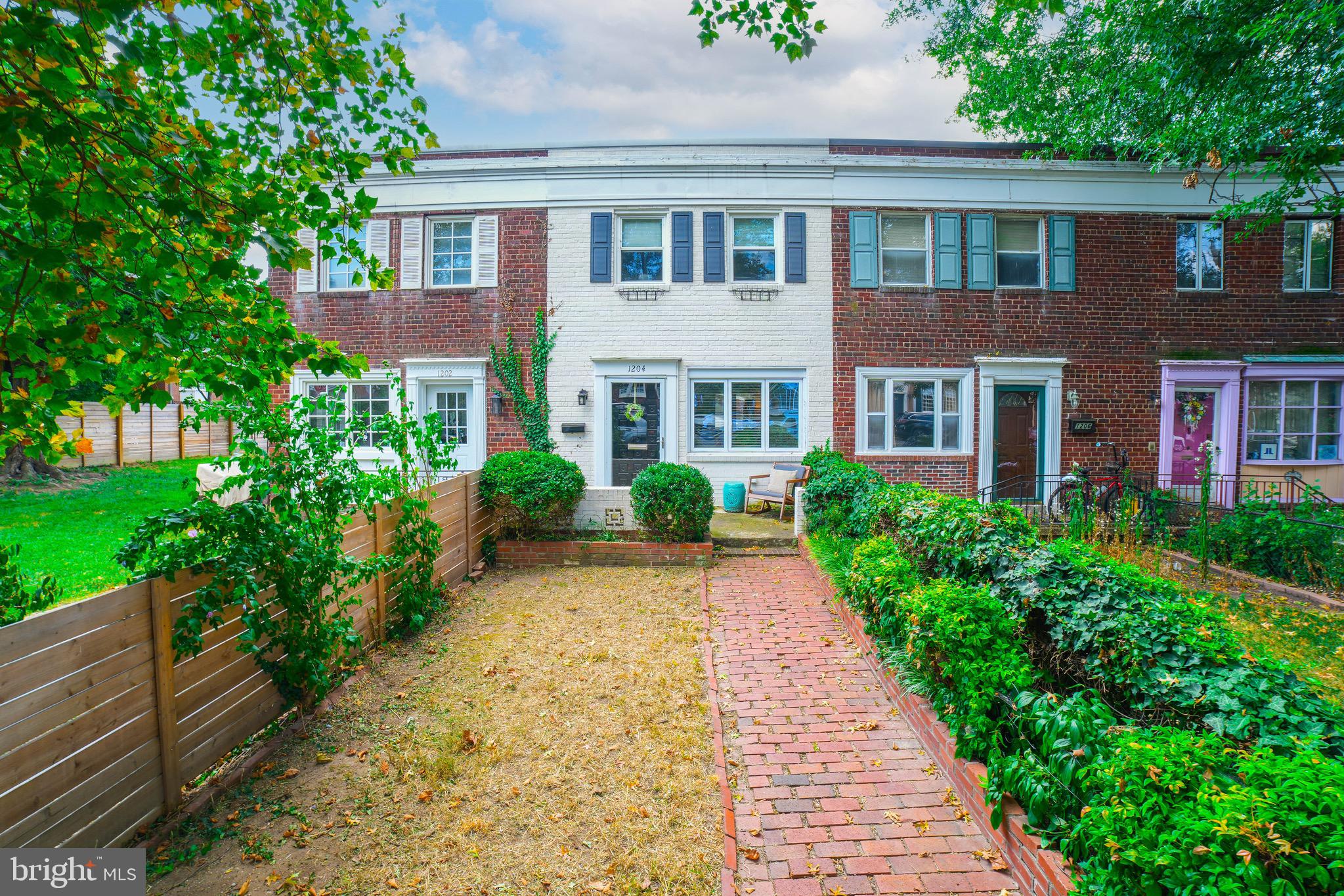 Live in the heart Old Town Alexandria! Light-filled all brick 2bedroom, 2bathroom townhouse with patio.  Hardwood floors on main and upper level, tile in basement and bathrooms. Upstairs bath recently renovated with subway tile , designer floor tile and chrome finishes.  Newer windows throughout. Granite countertops and stainless steel appliances in the expanded kitchen with gas cooking, expansive countertop space and numerous cabinets for storage.  Exit the door in the kitchen to grill and relax in your fully fenced backyard patio.  2 bedrooms and 1 bath upstairs. Basement has finished living area with a closet, a 1 full bathroom and a finished utility room with washer, dryer, utility sink, walkout door to outside and area for storage. New roof, HVAC system and hot water heater. A few blocks from all of the shops and restaurants King St and all of Old Town Alexandria has to offer! Easy access to King St METRO, 495 and DCA. Pets allowed. Available immediately. One year minimum lease minimum.
