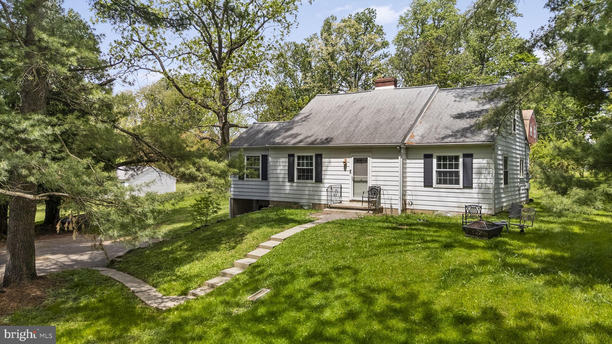 Property is being sold "as is". Tucked away on a beautiful one-acre lot just a few seconds outside of West Chester Borough, this charming Cape Cod-style detached single-family home offers the perfect blend of character, space, versatility, and opportunity. With 3 bedrooms, 2 full baths, 1 car garage and approximately 1,973 square feet.

Inside, you’ll find a home with solid bones and endless possibilities. The full basement with fireplace offers wonderful potential to create additional finished living space—perfect for a cozy family room, recreation area, home office, or personal retreat. A brand-new boiler heating system adds peace of mind and value for years to come.

One of the most intriguing features and added bonus of this property is the impressive 40' x 25' detached garage with a finished 2nd story area above. 

The home is in overall good condition and simply awaits your personal touches and cosmetic updates to truly make it shine. With its spacious grounds, flexible layout, classic Cape Cod charm, and highly sought-after location near shopping, dining, and major commuter routes such West Chester Pike corridor out to the Main Line, Wilmington, and Center City all within easy reach. A rare combination of land, character, and borough proximity. this is a rare opportunity to create the home you’ve been dreaming of in the heart of West Chester. Some photos digitally enhanced / decluttered for presentation purposes.  This property is located in area that is eligible for hook up to public sewer.  Buyer to do due diligence with East Bradford Township.
