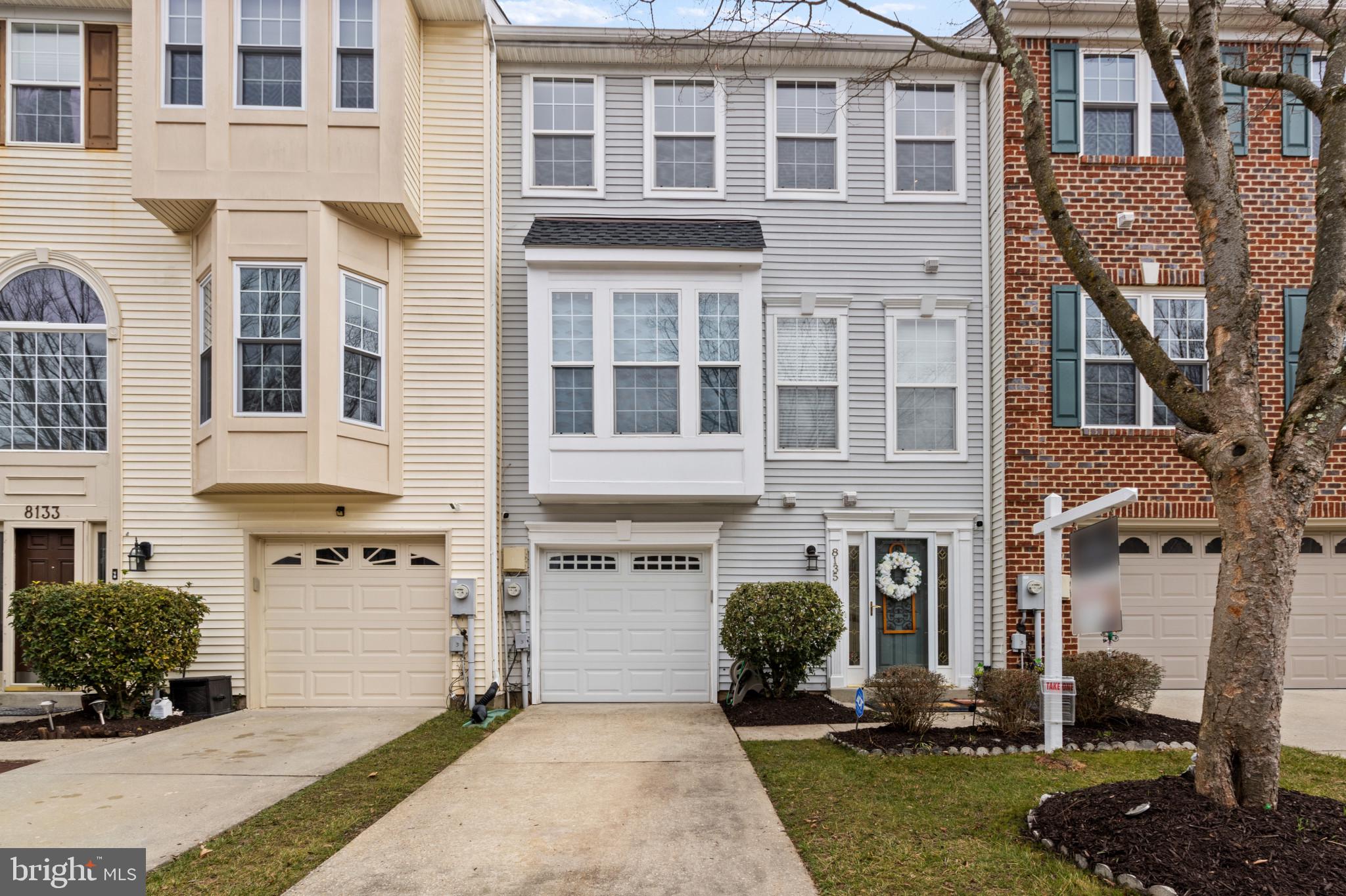 Turn-key townhome in amenity rich Russett offers over 2,154 sqft across
3 levels of livable and comfy spaces. A hardwood foyer welcomes you into this fine home featuring a family room with an angled fireplace, glass sliders to a paver patio and fenced
yard, and stairs to a core living area. Experience fun and relaxation on the main level boasting an open bright living room with glass slider stepping to a tiered deck, followed by a dining
room with statement lighting and vivid double windows overlooking the
deck. LVT flooring draws your attention in this well-equipped kitchen highlighted
by new sleek quartz counters, a peninsula island with a breakfast bar, 42"
raised panel cabinetry, crisp white appliances, a planning desk, a sunfilled
breakfast room, and a laundry room. Owner's suite presents a vaulted ceiling, a walk-in closet, a lighted ceiling fan, and a private garden bath displaying and updated double vanity, a
separate shower and a soaking tub. Community Amenities: basketball courts, trails, club house, meeting room, pool, tot lots, tennis courts.