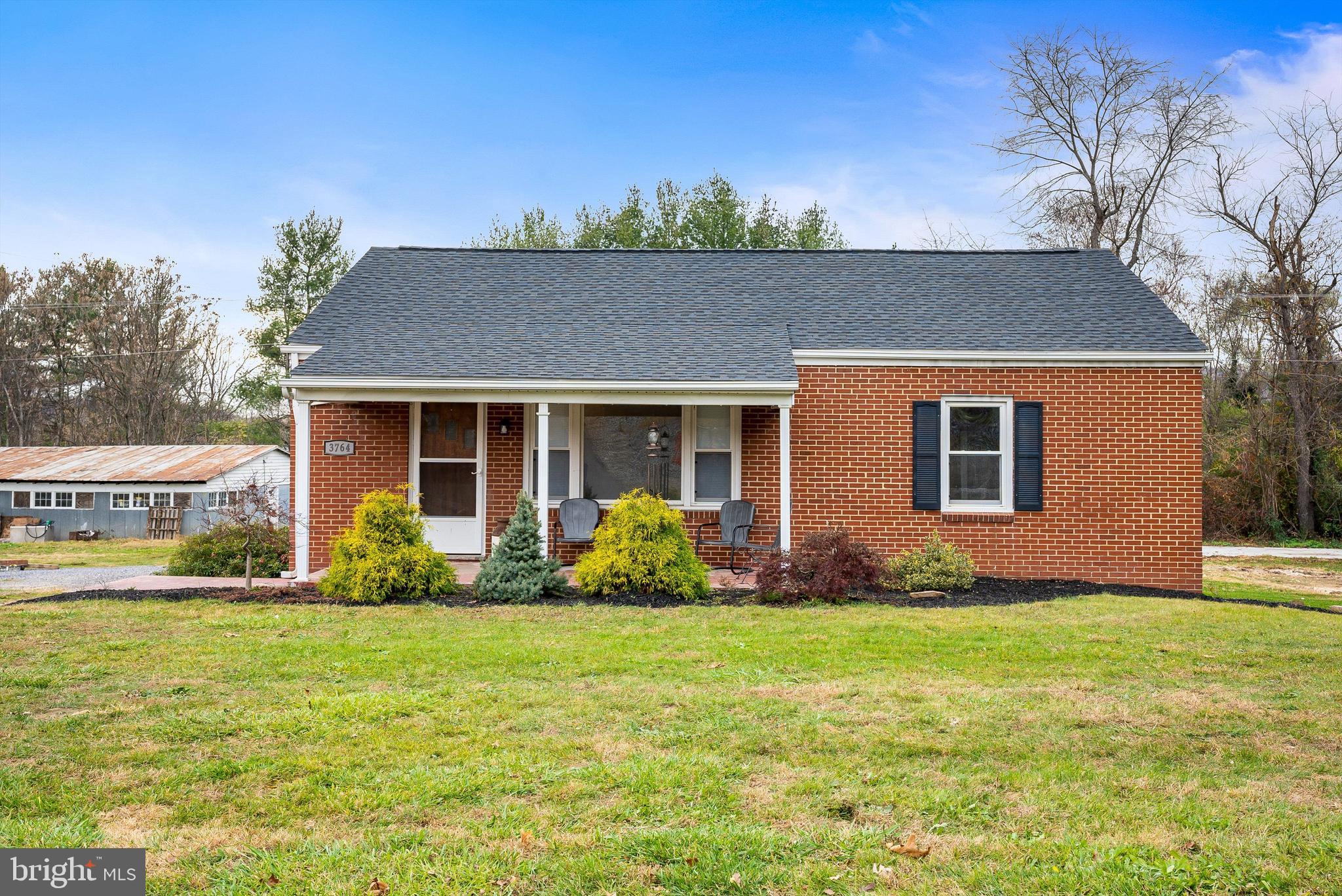 Back on the market - No fault of the seller. Welcome to this charming brick home set on a sprawling 1.2-acre lot, where modern updates meet timeless countryside charm. Inside, you'll find updated floors and fresh paint throughout, creating a bright and welcoming atmosphere. Recent upgrades include a new roof (2023) and an HVAC system (2019), ensuring year-round comfort and peace of mind. A mini-split system (2020) adds efficient climate control, enhancing the home’s appeal. New French doors in 2022. Outdoor enthusiasts and hobbyists will appreciate the 48x36 garage, perfect for vehicles, projects, or extra storage, along with the 24x12 shed, ideal for tools, gardening, or additional storage. The property also features a well pump replaced in 2018, further show casing its readiness for years of reliable living. This property offers a rural setting while remaining close to town conveniences. Don’t miss your chance to own this home that combines modern comfort, fresh updates, and versatile outdoor space!