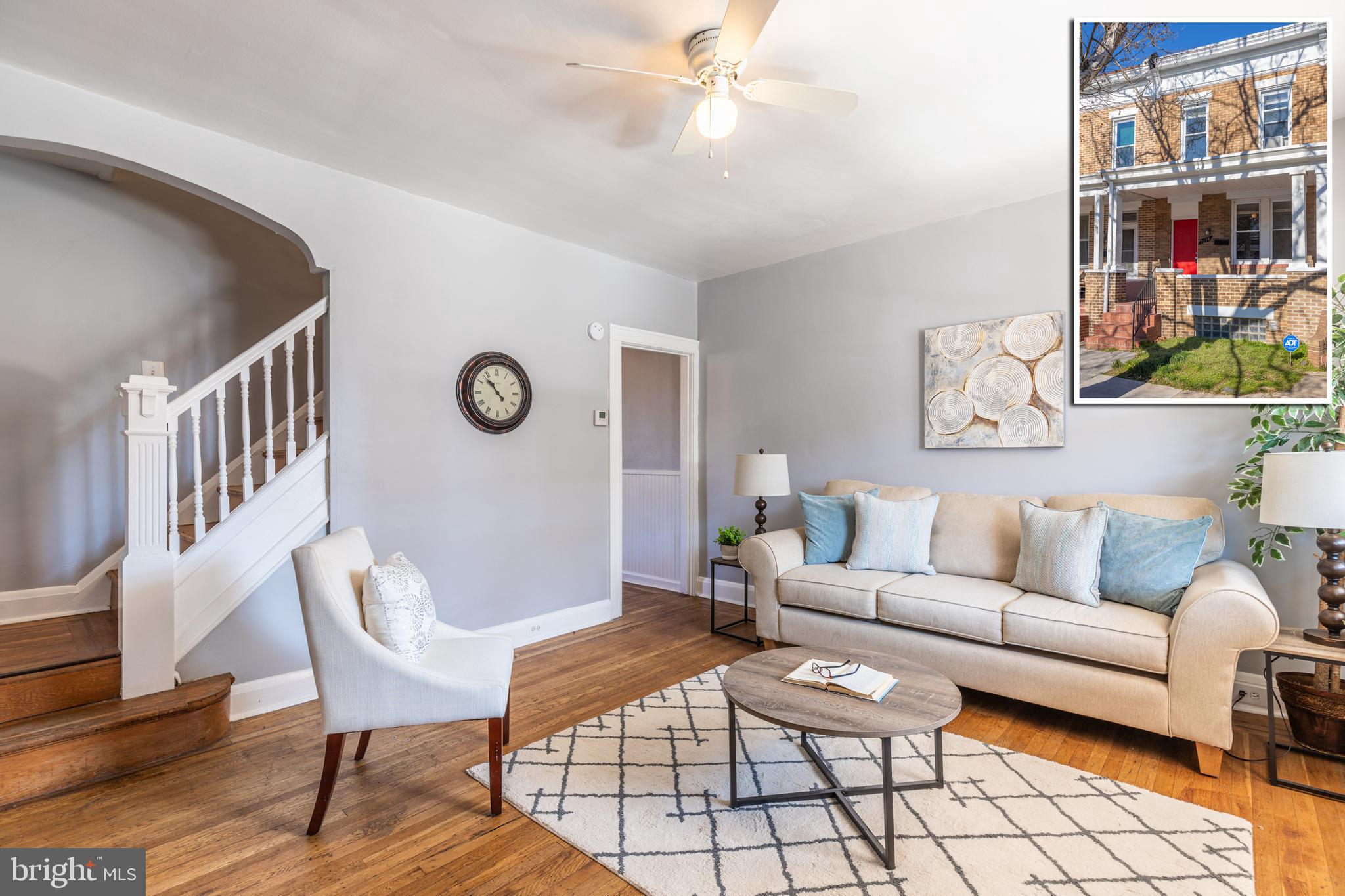 PICTURE PERFECT PORCH FRONT ROWHOME THAT'S MOVE-IN READY!  Features include an inviting living room, separate dining room with wainscoting and built in bookcases, upper level w/ 2 large bedrooms w/ hardwood floors and a full bath, full basement w/ laundry is perfect for storage space, and a large rear fenced yard!