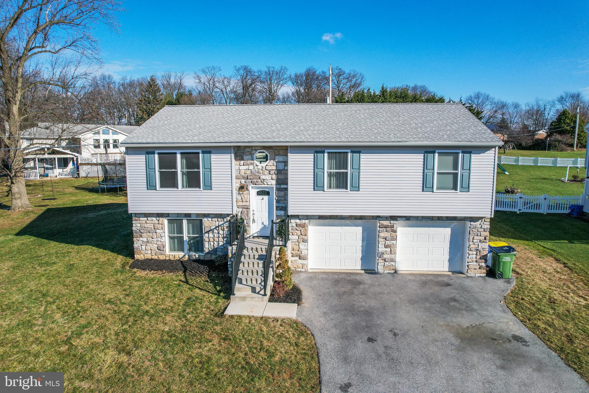 Welcome to 2817 Honey Valley Rd. in Dallastown—a dazzling embodiment of modern living, newly constructed in 2020! This exceptional split-foyer home boasts an open-concept floorplan that effortlessly combines style and functionality.

One of the highlights of this home is the abundance of natural light streaming into the living space, creating a bright and welcoming atmosphere. Every corner is bathed in sunlight, enhancing the contemporary charm of the home.

The kitchen is a culinary haven, featuring beautiful white soft-close cabinets, quartz countertops, and a generously sized kitchen island. Adding a touch of convenience, the sink is equipped with a motion-sensored faucet—making kitchen tasks a breeze. With ample cabinet space and stainless steel appliances, this kitchen is both practical and chic. The eat-in dining area seamlessly complements the kitchen, providing a cozy spot for casual meals or entertaining.

Throughout the entire home, revel in the luxury of LVP (Luxury Vinyl Plank) flooring, offering a sophisticated and durable foundation. The master bedroom is a private retreat with a full bathroom and dual closets, while the additional two bedrooms on the primary level also feature LVP flooring and spacious closets.

Downstairs, the lower level offers a completely finished bonus space—a versatile area perfect for a second living space, home office, or entertainment room. Storage and easy access to the 2-car garage complete the lower level, adding practicality to the home.

Situated on a level lot, this property features composite decking for maintenance-free living. Picture yourself relaxing or entertaining on the deck, creating cherished moments with friends and family.

This residence epitomizes "NEW NEW NEW!"—from its 2020 construction to its modern features and finishes. Don't miss the opportunity to make 2817 Honey Valley Rd. your home. Schedule a showing today to experience the contemporary elegance, convenience, and radiant living space firsthand!