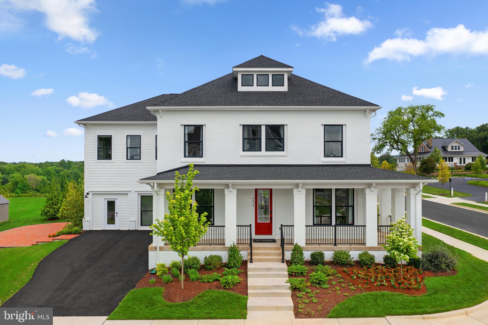 Discover a MOVE-IN READY single family home in Fauquier County offering a unique collection of upgraded structural options and designer finishes. This is a rare opportunity to own the professionally designed MODEL HOME at Heritage at Marshall, just an easy walk to Main Street in Downtown Marshall, VA. Stella 55-F2 - Homesite 11 offers four bedrooms, four full bathrooms, one half bathroom, and 4,271 finished square feet across three finished levels. A wraparound front porch welcomes you inside, where 9 ft. ceilings, oak stairs, Luxury Vinyl Plank flooring throughout, custom paint, and upgraded designer details create a polished, cohesive home. The open-concept main level centers around a gourmet kitchen featuring an extended island with additional storage, white soft-close cabinetry, matte grey quartz countertops, GE stainless steel appliances, a five-burner cooktop, a smart convection wall oven, built-in microwave, and a large walk-in pantry with shelving. The kitchen flows seamlessly into the great room, where an electric fireplace and enhanced windows create a bright, inviting gathering space. A formal dining room, private study with double glass doors, powder room, and family foyer complete the main level. Upstairs, the spacious primary suite features an oversized walk-in closet with a custom closet system, while the ensuite full bathroom offers dual vanities, white quartz countertops, a soaking tub, and a frameless shower with a seat and floor-to-ceiling tile. Three secondary bedrooms each include walk-in closets, complemented by two additional full bathrooms. The laundry room is fully equipped with a GE washer and front-load dryer, utility sink, cabinetry, and countertops. The walk-up finished basement expands the home's versatility with a large rec room, flex room, full bathroom, and a built-in wet bar finished with white soft-close cabinetry and quartz countertops—ideal for entertaining, overnight guests, or multigenerational living. Outside, a custom brick patio, professionally designed landscaping, and the wraparound porch provide inviting outdoor living spaces. Additional highlights include a two-car front-load garage with opener and keypad, smart home automation with structured wiring, smart thermostat, whole-home air purification and humidification systems, and solar-panel readiness. Being a new build, your home is constructed to the highest energy efficiency standards and comes with a post-settlement warranty. This home offers available closing cost assistance when financing with Intercoastal Mortgage and closing with Walker Title. 

-----This home is available for self-guided touring through NterNow, no agent or appointment required. Buyers may visit independently during daylight hours. Scan the QR code at the door for instant access and follow a few quick prompts to let yourself in. For more information, visit our website or call Van Metre Homes.

-----Welcome to Heritage at Marshall, an impressive master-planned community nestled in the foothills of the Blue Ridge Mountains. Embodying the essence of premier living in Fauquier County, Heritage at Marshall grants residents access to a host of amenities, including open green spaces with walking and jogging trails, a picturesque outdoor swimming pool, serene ponds and nature areas, a welcoming community clubhouse, and a fun-filled tot lot with an outdoor playset. Experience the perfect harmony of modern living and timeless natural beauty at Heritage at Marshall, a true sanctuary that strengthens the community for generations to come.

-----*Other homes sites and delivery dates may be available. Pricing, offers, and availability are subject to change without notice. Images, renderings, and site plans are for illustrative purposes only and may not reflect actual homes or features. Some images and renderings may depict interior designs created in collaboration with AI. Additional terms and conditions may apply. Please see a Van Metre Sales Advisor for details.