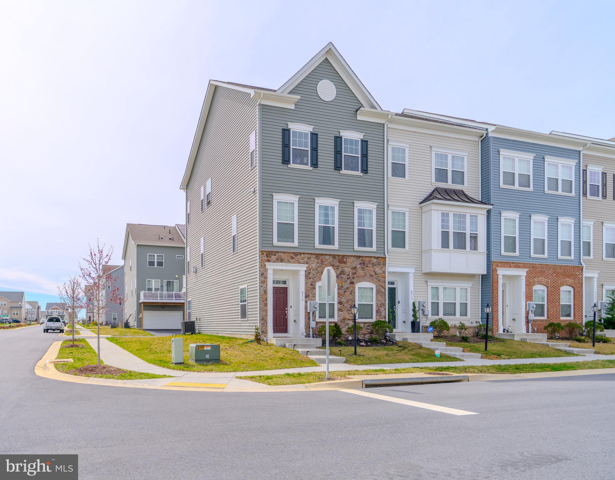 This stunning corner lot townhouse in Frederick, MD offers three levels of bright and open living space, filled with natural light. The first level features a bedroom and full bath with convenient access to the two car garage and driveway, making it perfect for guests or a private home office. The main level boasts an open-concept design, centered around a modern kitchen with white countertops, shaker cabinets, stainless steel appliances, and a spacious island, perfect for entertaining. Hardwood flooring flows throughout, adding warmth and elegance to every level, while a cozy fireplace in the living area creates the perfect spot to relax. The primary suite on the upper level offers a walk-in closet and an en suite bathroom, providing a private retreat. Enjoy outdoor living on the deck, and take advantage of fantastic community amenities, including a tot lot/playground and a trail leading directly to Pinecliff Park, nestled along the Monocacy River. Located just minutes from Downtown Frederick, this home is close to shopping, dining, and all the best the area has to offer. Don't miss this opportunity!