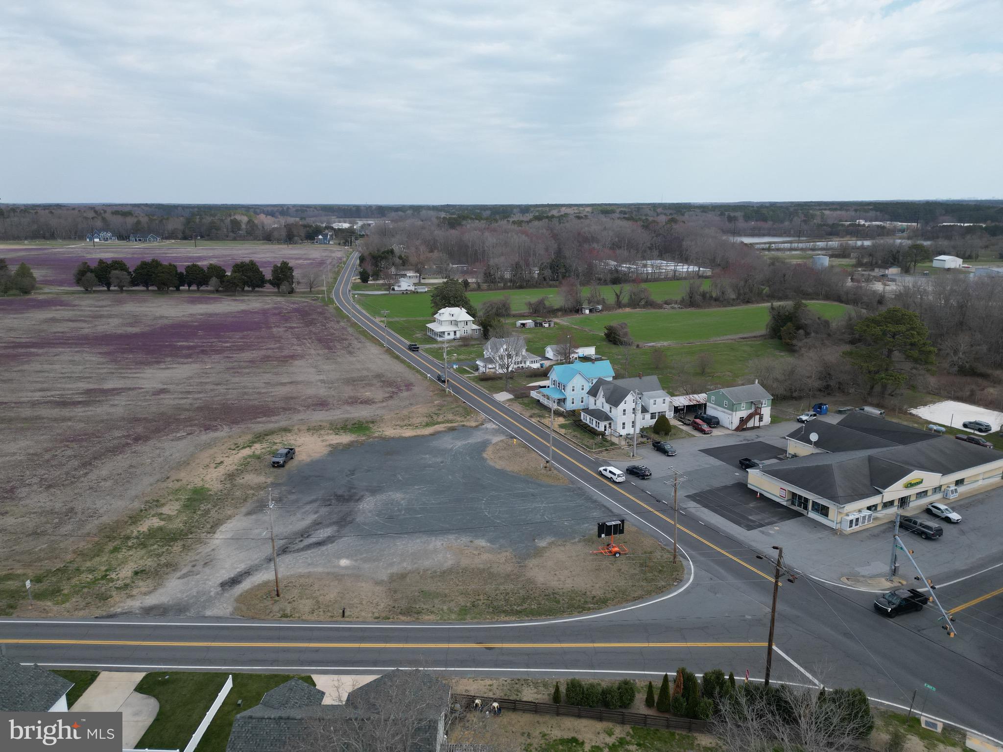 Endless possibilities, Commercial lot. 1 acre with a short walking distance to downtown Berlin. Sale to include 4 Edus. Many uses for this vacant parcel. Tremendous exposure on Main Street going into downtown Berlin.