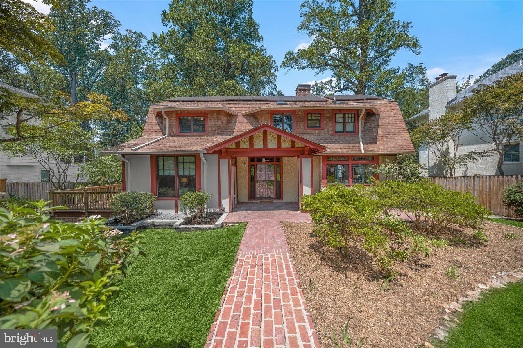 Stunning N Arlington Home in sought after Lorcom Grove with beautiful outdoor space!  Charming, spacious, and energy efficient 5 bed and 5 bath home with modern luxuries and turn of the century character; solar panels, soaring 9’6” ceilings, skylights, and more.  Main level features a chef's kitchen with island seating and butler's pantry, full sized dining room with access to oversized Trex deck and patio, office with garden view, den with bay window, and gracious formal living room with original exposed beams, leaded glass windows, and a statement fireplace. Main level full bath has been expertly updated for accessibility. Dramatic staircase to upper level, with skylights and midcentury modern light fixture, leads to an open hub. Inviting primary suite includes built-ins, walk-in closet with custom shelving, and enviable bath with standing tub, double vanity, and huge step in shower. Upper level also has three generously sized bedrooms, two full sized baths, and a laundry room with full-sized front-loading washer and dryer.  Lower level has a large sun filled rec room with access to back yard patio, fifth bedroom and full bath, and large storage room. Exterior features include a low maintenance garden, playground equipment, and a large driveway that fits four cars. Monthly electric bill is as low as $10. House is wired with ethernet jacks in most rooms for secure internet access, as well as having hard-wired Wi-Fi access points on each floor to deliver seamless whole house coverage. Eligible for Donaldson Run Recreation Association pool membership. Fantastic location only a 5-minute drive to DC and near major commuting arteries. Walk to restaurants, shops, schools, farmer market, trails and parks. Lorcom Grove/Lee Heights is a well-established community offering rich architectural details, a strong sense of neighborliness and beautiful homes all in an easily accessible location.
