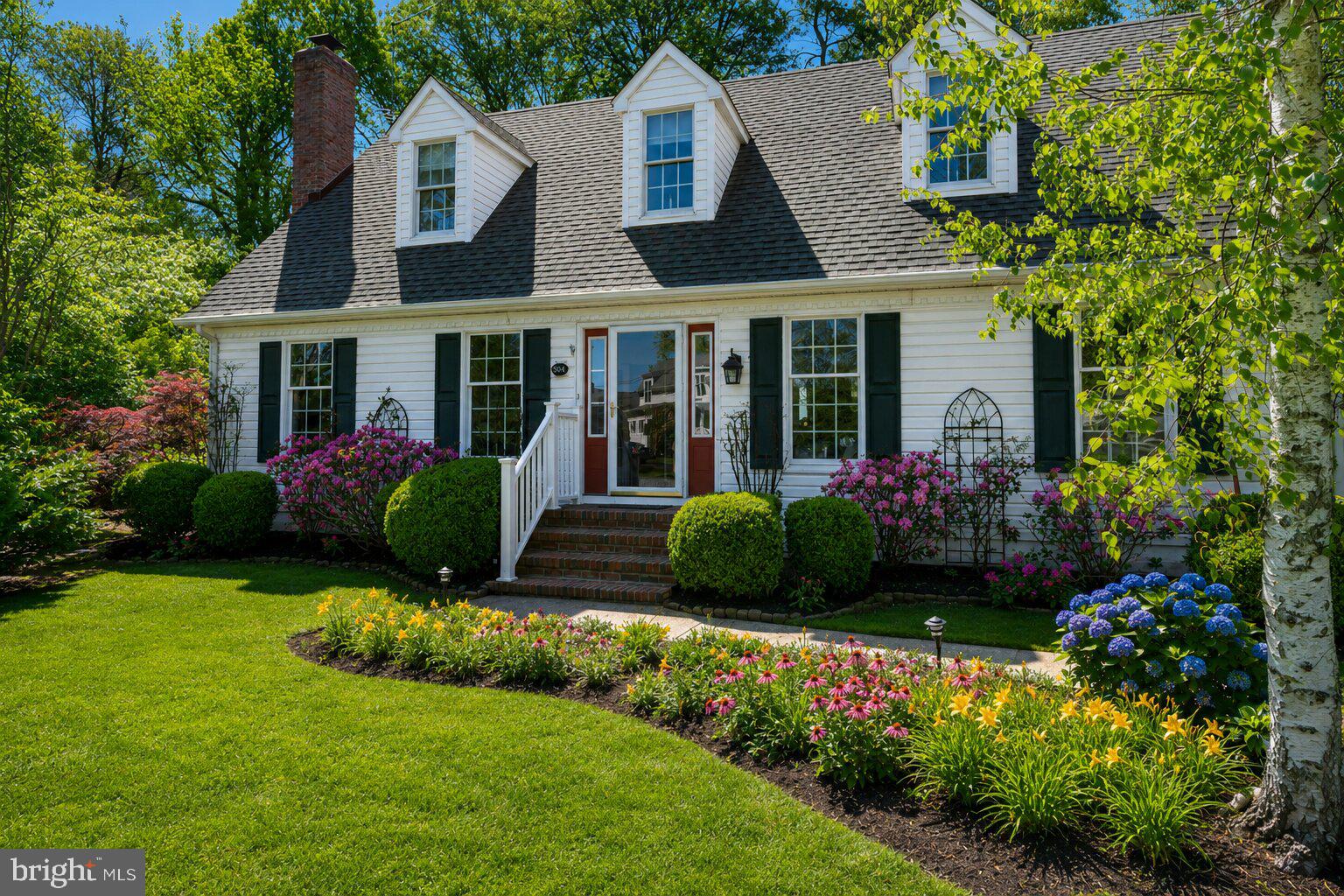 Charming yet completely reimagined, this beautifully remodeled home offers refined Eastern Shore living at its best. Set on beautifully landscaped grounds featuring lovely water views and a partially fenced rear yard with paver patio. Thoughtfully designed and updated the main level features a modern kitchen with newer appliances, cozy breakfast room, living room with fireplace, formal dining room, and fabulous sunroom. The main level owner’s bedroom has a recently remodeled en-suite bath. The second floor is currently set up as a guest apartment with private entrance. This apartment offers a private bedroom, full bathroom, kitchen, living room, dining area and dedicated laundry. In the yard you will find a Williamsburg Garden shed plus separate workshop which includes attic, HVAC, and running water. Parking for several vehicles. Encapsulated crawl space. Thoughtfully designed and move-in ready. This home could easily be converted back into a 3-4 bedroom house. Waterfront park only steps away.great for watching the boating activity and fireworks. Prime location close to downtown amenities, shopping, restaurants, and public water access.
