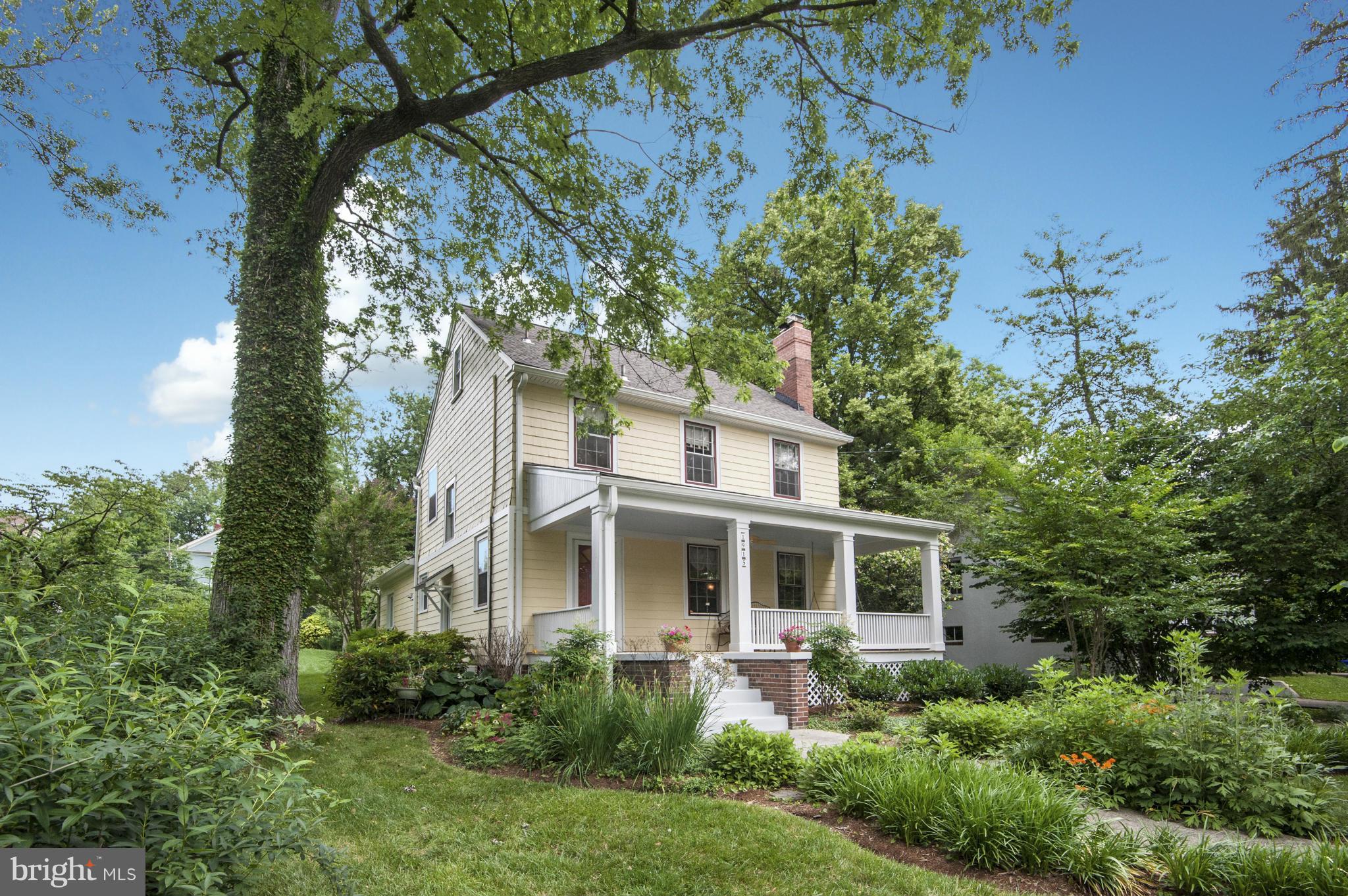 Charming 1928 farmhouse in Woodside, walk to Metro & DTSS. Meticulously maintained w/fabulous "Swedish Country Kitchen" renovation boasting granite counters, soft-close cabinetry, SS appliances, & hand-painted tiles by Christina Keune. Four finished levels, large family room w/skylights, newly built detached garage, abundant light & character, lush & verdant grounds. Won't last long!