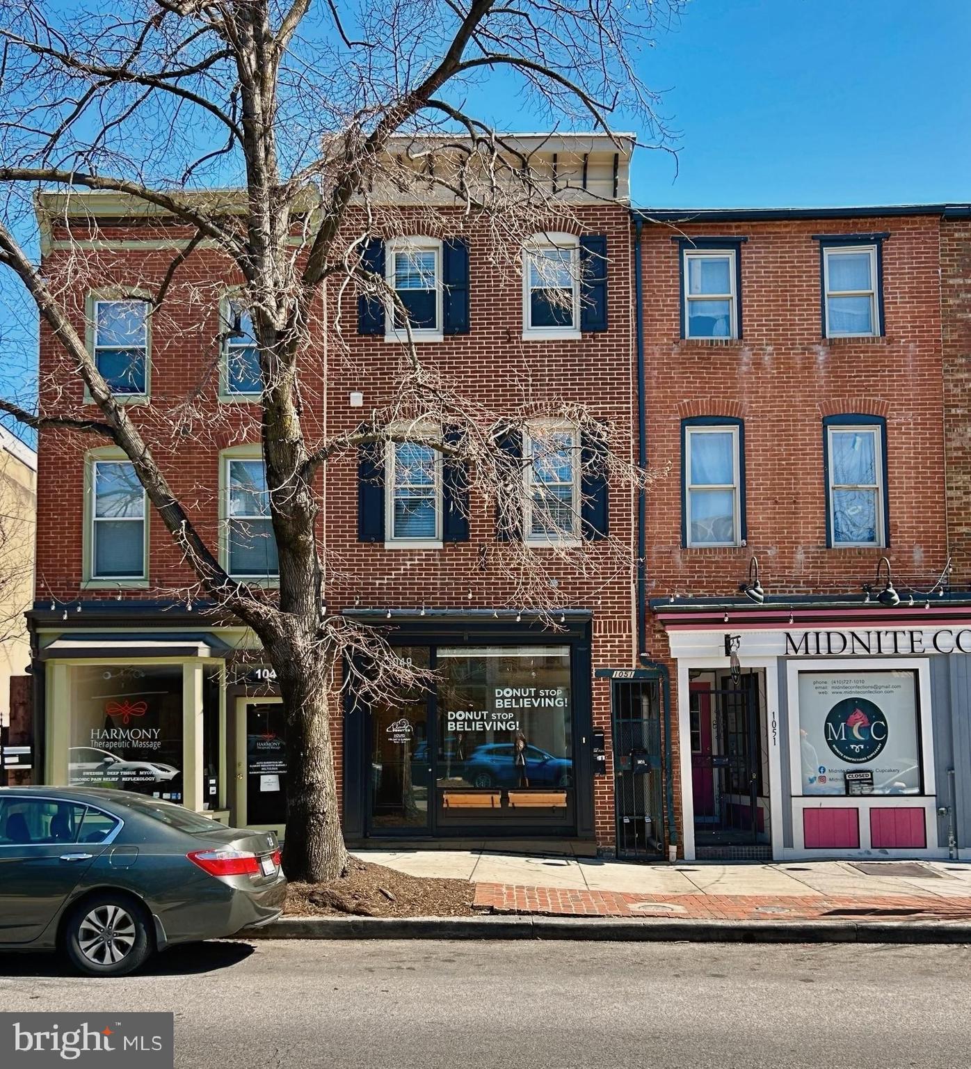 Welcome to 1049 S Charles St! A prime mixed-use (retail/office w/residence) for sale in the very
heart and soul of Federal Hill! Renovated, modern & light-filled with 2328 square feet and 3 levels
with the 1st floor offering a retail and or office space.

 This fantastic commercial space offers one of the best locations in all of Baltimore City with a wonderful store front, plenty of storage and a large public restroom. The residence is the 2nd and 3rd floors which consists a of 3-bedroom, 1.5 bath home and or apartment with gorgeous hardwood floors, interior exposed brick, stainless steel appliances in kitchen, and front-load stacked washer and dryer. There’s a whirlpool tub in bathroom. The 3rd bedroom off the kitchen could be a den or office area which is adorned with charming & rustic barn doors for privacy.

 This location is conveniently a 1/2 block from vibrant Cross Street Market, within walking distance to Federal Hill Park and many local businesses. Easy access to the stadiums, 295, 95, Inner Harbor and other nearby attractions. This is so easy to show!