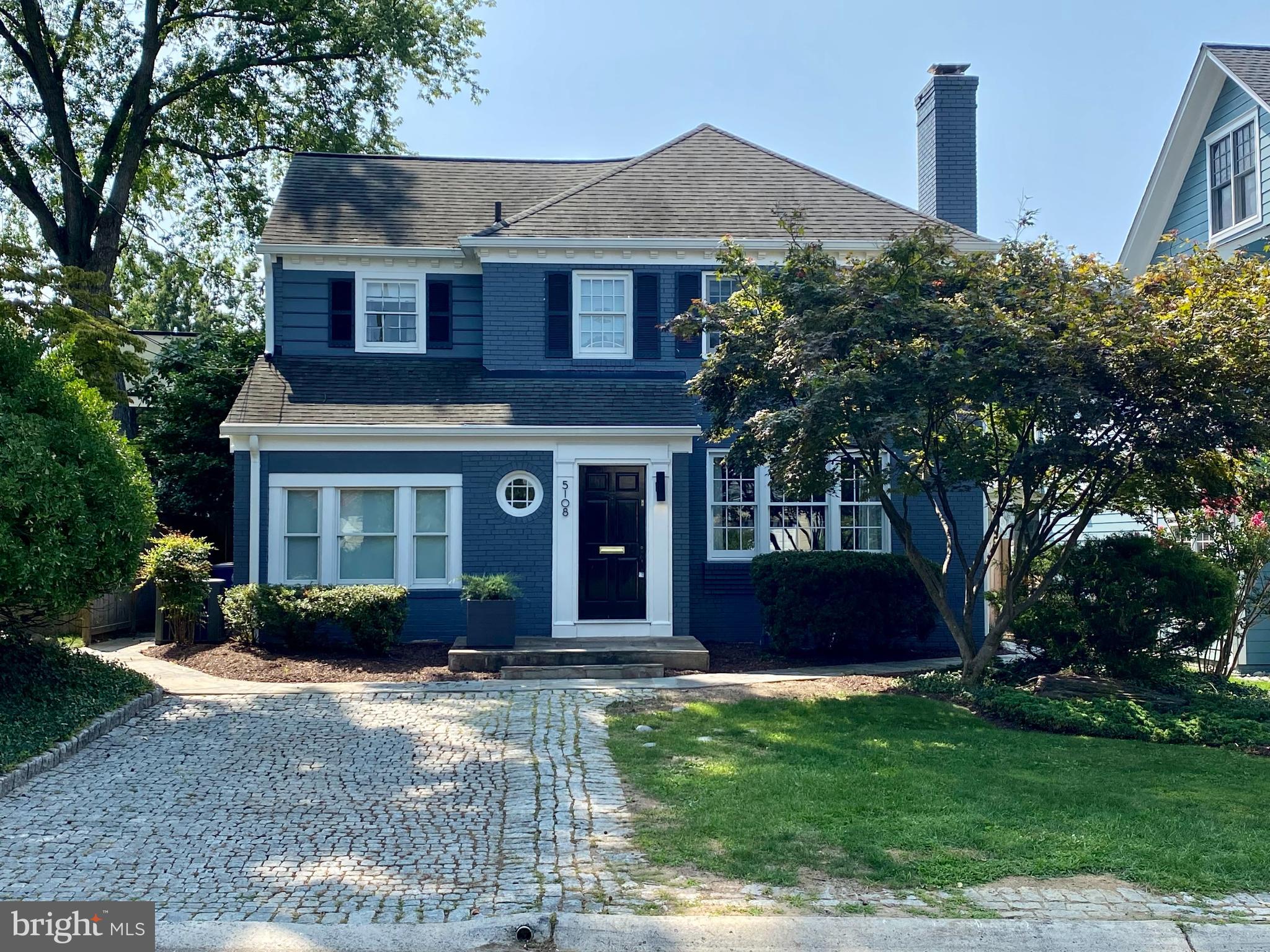 Welcome to 5108 Fairglen Lane in Chevy Chase, MD! Nestled on a quiet street, this stunning home sits on a 5186 square foot lot and offers an unbeatable location with unparalleled convenience to downtown Bethesda, where you can enjoy a vibrant array of shops, restaurants, and the Metro. With everything so close, you'll find it easier to walk than to drive and find parking in Bethesda. Those who enjoy exercising will love the proximity to the Capital Crescent Trail, perfect for biking, walking, or commuting to DC and Bethesda Pool is down the street!

Step inside to discover an interior blending modern finishes with thoughtful updates. The main level includes a bright living room with recessed lights, a bedroom with an ensuite full bathroom, and an expanded kitchen that creates an open floor plan. The kitchen is highlighted by  glass doors that lead to a large flagstone patio and a flat, fenced yard with new sod and trees.

The upper level has been recently renovated to include a large primary suite with a designer bathroom featuring custom finishes, heated floors, and a spacious closet/dressing room. Additionally, the upper level includes another well-appointed bedroom and a tastefully updated hall bathroom with decorative tile and a bathtub.

The walk-out lower level is finished and includes a full bathroom, a versatile living area, an exercise room, and a new tankless hot water heater. Don't miss out on this exceptional home!