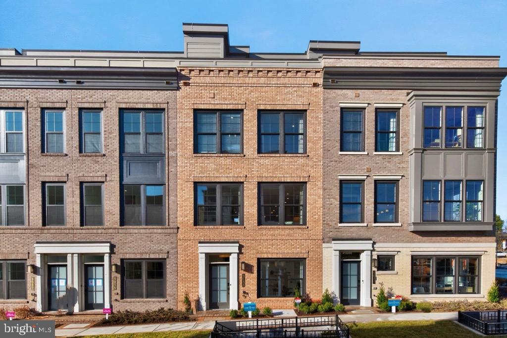Model homes now open!!   Come see why over 75 homes have sold since opening in less than 1 year.  The new neighborhood of 108 townhomes is just moments from the Grosvenor Strathmore Metro, the Music Center at Strathmore,  Rock Creek Park, downtown Kensington, and Pike & Rose.  The Coltrane lot 76 is a a brand new end unit 4-level brownstone with over 2,345 SqFt , 4 BR, 4.5 BA,  private elevator,  2-car garage, and a rooftop terrace.  House under construction now and  early Summer 2026 move in.  Photos of model home and actual finishes may vary.