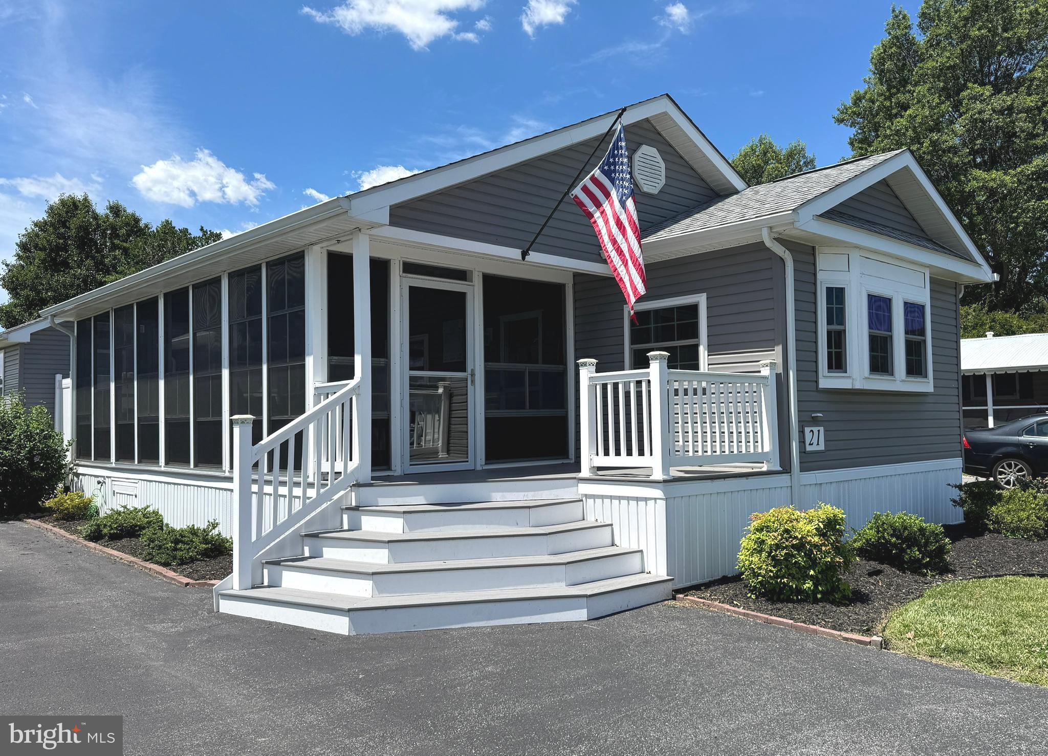 If you missed out the last time, now is your chance to own this nicely updated home! This home with a LOW monthly land rent of only $685.00 is in the desirable community of Colonial East.  With being ideally located you are approximately 5 miles to the charming historical town of Lewes, or the famous Rehoboth Beach and its boardwalk.  Imagine walking out of your front door and being within walking distance to several restaurants, a Dollar Tree, a gym, a movie theater, a Rits’s, a go-cart track, a water park, mini golf, public transportation and outlet shopping!  Many updates of this home took place with the previous owner between  2022-2024.  In 2025 the current owner updated the plumbing  underneath the home with PEX,   had a new tankless hot water heater installed, updated some lighting in the home, and had the breakers replaced with the required GFCI in electrical panel.  Additional features of this home are as follows: A beautiful large Vinyl Tech three seasons porch adding a wonderful extension to the home. A sitting area with vaulted ceiling and skylights in the owner’s bedroom, a great space for your office or a craft room.  Dual sinks in the hall bathroom. Jack-n-Jill ½ bath conveniently located between the other two bedrooms.  Cheery kitchen with white kitchen cabinets, granite countertops and plenty of storage. Home is also completely furnished.  Outside you will find a front deck for your morning coffee, a good size storage shed for all your beach gear and an outdoor shower to wash away the sand. Monthly land rent amount of $685 includes use of the swimming pool, lawn mowing, clubhouse access and street maintenance.  Interested buyers will need to apply to the community for a credit/background check for approval. Closing costs to buyer will include ½ of the 3.75% DMV Transfer Fee, a $400 closing agent cost and any utilities associate with this home will be pro-rated to the day of settlement.