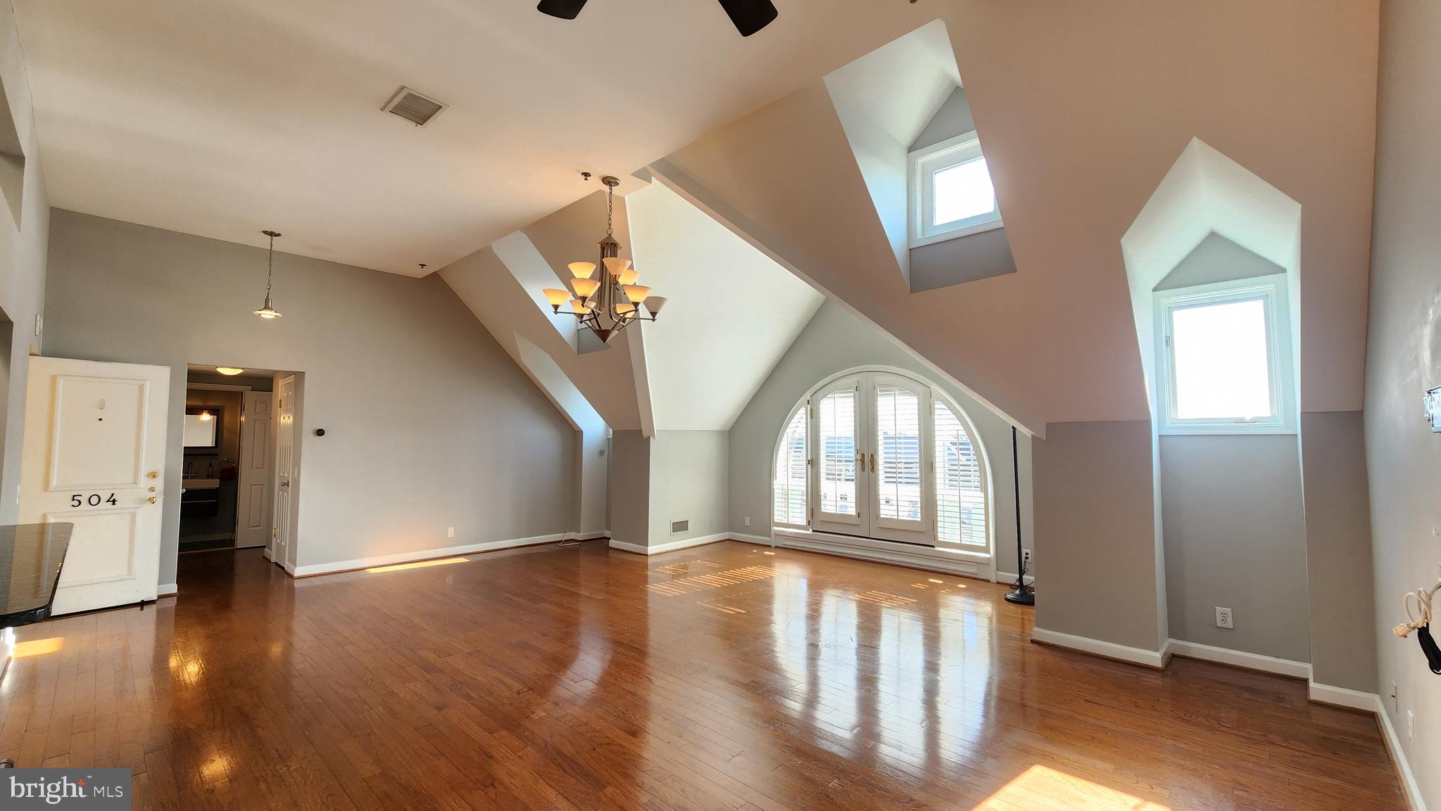 A rare find! Fabulous penthouse loft for rent in the heart of Old Town Alexandria. Beautifully renovated, high ceilings and skylights, lots of light. Open floorplan, wood floors, spacious rooms, kitchen with granite breakfast bar, pantry for extra storage. The master suite features a walk in closet and a fireplace. This unit includes garage parking. Enjoy a private, tucked away courtyard above street level. Move in fee with condo association applies.