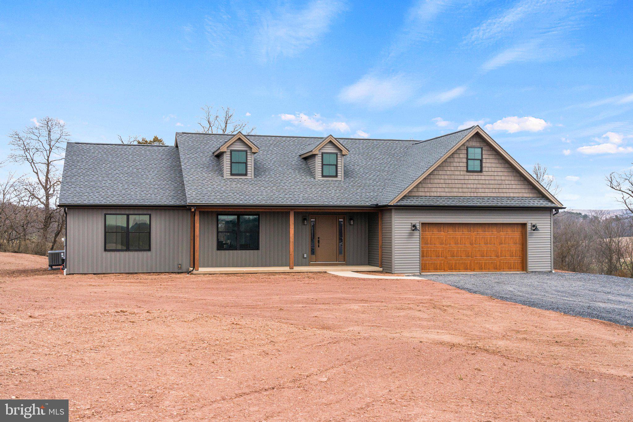 Welcome to your brand-new dream home!
This beautifully crafted ranch-style residence offers 1,794 sq. ft. of modern living space, perfectly situated on 2.24 peaceful acres in a quiet cul-de-sac. Just completed and move-in ready, this home features 3 spacious bedrooms and 2 full bathrooms, designed with comfort and functionality in mind.

The open-concept main level showcases a custom kitchen with elegant quartz countertops, a generous dining area, and a cozy living room perfect for relaxing or entertaining. Step outside to the back patio, ideal for hosting gatherings or enjoying quiet evenings outdoors. The attached garage and full basement provides added convenience and storage.

Enjoy the tranquility of country living while staying close to it all—just minutes from US-322 and Newport Plaza. This is your opportunity to own a serene retreat with modern amenities and easy access to shopping, dining, and more.

Don’t miss out—schedule your private tour today!