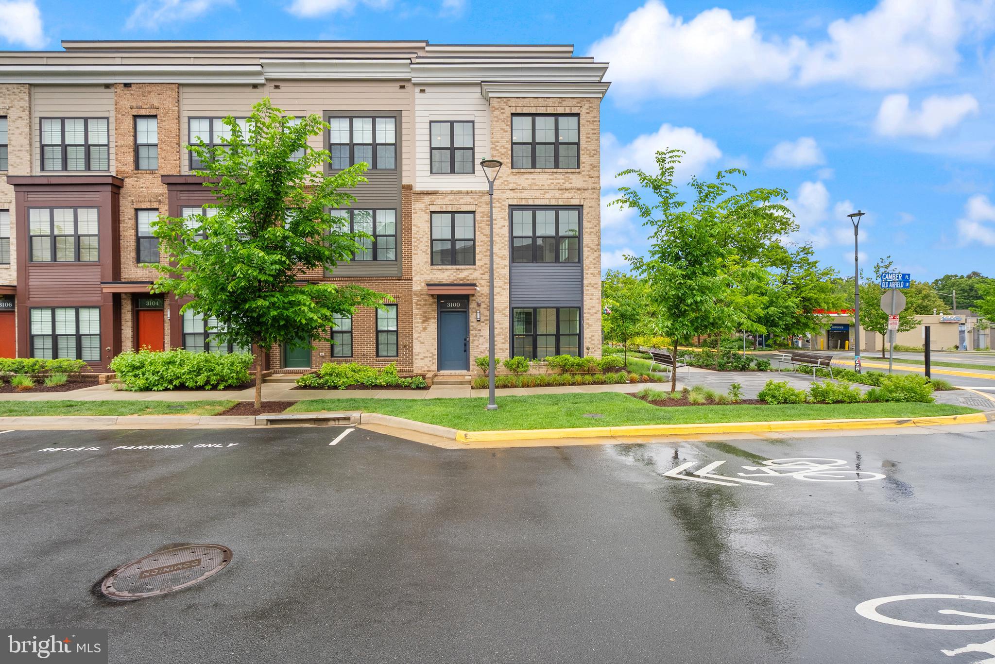 Welcome to 3100 Camber Place, a stunning end-unit 2023 newer-construction townhome in the heart of Falls Church that shows like new inside and out. This pristine residence offers approximately 2,350 square feet of stylish, low-maintenance living with 5 bedrooms and 4.5 bathrooms. The first floor features a spacious in-law suite with its own bedroom and full bathroom—perfect for extended family, guests, or multi-generational living. Moving to the second floor, the open-concept main living area is flooded with natural light and includes a sleek gourmet kitchen with granite countertops and stainless steel appliances, beautiful hardwood flooring, and designer finishes throughout.The entire home has been professionally touch-up painted, giving it a crisp, immaculate, move-in-ready appearance. Modern smart-home convenience comes standard with motorized electrical blinds installed throughout—easily controlled from your phone or voice assistant for effortless lighting and privacy. Step outside to enjoy the private deck and take advantage of the attached garage. Ideally located inside the Beltway and just steps away from the Graham Park Plaza shopping center, this home provides unbeatable convenience to dining, groceries, major commuter routes, and Metro — delivering the perfect blend of modern comfort and thoughtful design.