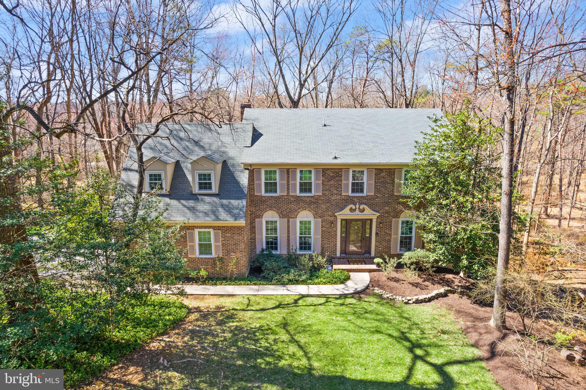 Welcome to 11223 Cranbrook Lane, Oakton, VA—a home that perfectly combines updated living with classic charm. Nestled in the sought-after neighborhood of Miller Heights, this exceptional home boasts over $200,000 in upgrades including a new architectural shingle roof & skylights, energy-efficient windows, remodeled upper level bathrooms, and private three-tiered deck. The main level of this traditional colonial features a private front office with french double doors, as well as a large living room and separate dining room that connects directly to the heart of the home—the kitchen. The kitchen is equipped with white cabinets, granite countertops and updated stainless steel appliances.  The eat-in area makes this space perfect for both casual meals and entertaining.  Adjacent to the kitchen, a family room with a vaulted ceiling and fireplace provides seamless access to the deck and outdoor living space, making it ideal for hosting gatherings or enjoying quiet evenings. Upstairs, the primary suite offers a tranquil retreat with its generous seating area and a renovated bathroom featuring double vanities, a soaking tub, and a seamless glass shower. Three additional bedrooms and a renovated hall bathroom complete this level. The finished lower level is a versatile space with a full bathroom, two additional bedrooms and a flex/office space. The rec room provides walk-out access to the lower-level deck and highlights the parkland behind this home. This home offers a perfect blend of privacy and accessibility. It is ideally positioned near several community trails and is only minutes to I-66, Vienna Metro, Fair Oaks Shopping Centers, Reston and Tysons Corner. Located in the Oakton High School Pyramid. Don’t wait…this gem will not last long.