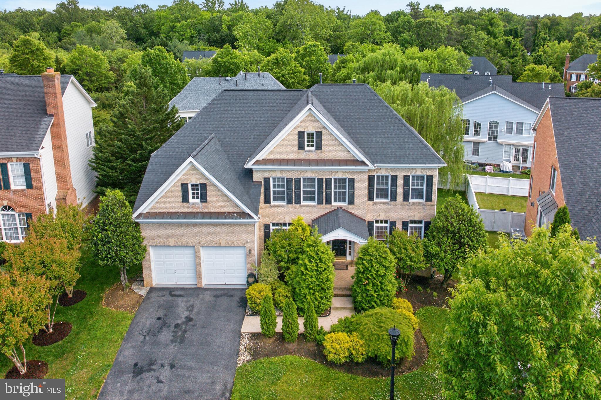 704 Caleb Lane is beautifully maintained and loaded with recent updates in the highly sought-after, amenity-rich Kingsport community of Annapolis. The spacious, open floor plan is enhanced by the many value-added updates in the home, including the renovated kitchen, roof (2022),  HVAC systems (2025 and 2022), and water heater (2022).  The light-filled walk-out lower level is a complete in-law/au pair suite that includes a kitchen,  both a full AND a half bath, a 2nd laundry, and not one but two bedrooms!   A huge bonus and sheer perfection for guests, multigenerational living, a theater room, or an extended entertaining space. The stunning main-level kitchen is designed to impress, featuring sparkling granite countertops, a massive center island, custom cabinetry, and convenient access via a fun and functional secondary staircase. The kitchen opens seamlessly to the dramatic two-story Great Room, highlighted by a cozy gas fireplace, soaring windows, and elegant custom wood blinds that run throughout the main level. Beautifully maintained hardwood floors run throughout the home, adding warmth and timeless appeal. Outside, the pristine driveway and oversized two-car garage provide ample parking and storage space for gardening, landscaping, and recreational needs.

Situated on nearly a quarter-acre lot,  the property is the best location in the neighborhood, just two short blocks from the community pool, clubhouse, playgrounds, water access for kayaking and fishing, and scenic walking and biking trails. This exceptional property offers the perfect blend of comfort, elegance, and convenience. Located only 10 minutes from Downtown Annapolis, this home provides the tranquility of private community living without sacrificing easy access to shopping, dining, and waterfront attractions.

This elegant home truly checks every box — offering exceptional space, thoughtful upgrades, outstanding community amenities, and an unbeatable Annapolis location.