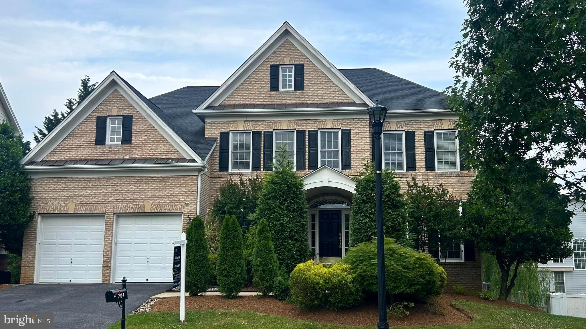 704 Caleb Lane is beautifully maintained and loaded with recent updates in the highly sought-after, amenity-rich Kingsport community of Annapolis. The spacious, open floor plan is enhanced by the many value-added updates in the home, including the renovated kitchen, roof (2022),  HVAC systems (2025 and 2022), and water heater (2022).  The light-filled walk-out lower level is a complete in-law/au pair suite that includes a kitchen,  both a full AND a half bath, a 2nd laundry, and not one but two bedrooms!   A huge bonus and sheer perfection for guests, multigenerational living, a theater room, or an extended entertaining space. The stunning main-level kitchen is designed to impress, featuring sparkling granite countertops, a massive center island, custom cabinetry, and convenient access via a fun and functional secondary staircase. The kitchen opens seamlessly to the dramatic two-story Great Room, highlighted by a cozy gas fireplace, soaring windows, and elegant custom wood blinds that run throughout the main level. Beautifully maintained hardwood floors run throughout the home, adding warmth and timeless appeal. Outside, the pristine driveway and oversized two-car garage provide ample parking and storage space for gardening, landscaping, and recreational needs.

Situated on nearly a quarter-acre lot,  the property is the best location in the neighborhood, just two short blocks from the community pool, clubhouse, playgrounds, water access for kayaking and fishing, and scenic walking and biking trails. This exceptional property offers the perfect blend of comfort, elegance, and convenience. Located only 10 minutes from Downtown Annapolis, this home provides the tranquility of private community living without sacrificing easy access to shopping, dining, and waterfront attractions.

This elegant home truly checks every box — offering exceptional space, thoughtful upgrades, outstanding community amenities, and an unbeatable Annapolis location.