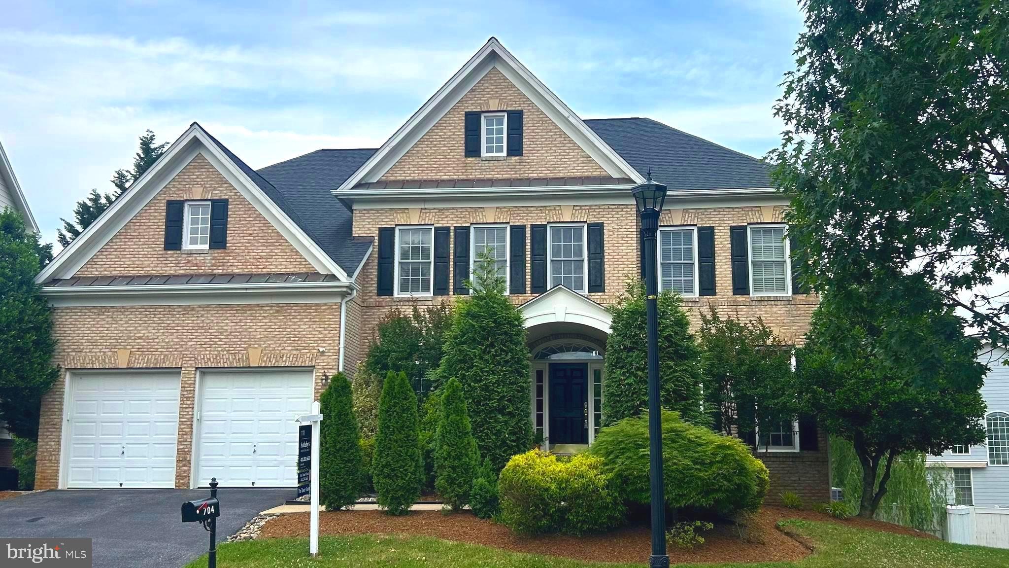 704 Caleb Lane is beautifully maintained and loaded with recent updates in the highly sought-after, amenity-rich Kingsport community of Annapolis. The spacious, open floor plan is enhanced by the many value-added updates in the home, including the renovated kitchen, roof (2022),  HVAC systems (2025 and 2022), and water heater (2022).  The light-filled walk-out lower level is a complete in-law/au pair suite that includes a kitchen,  both a full AND a half bath, a 2nd laundry, and not one but two bedrooms!   A huge bonus and sheer perfection for guests, multigenerational living, a theater room, or an extended entertaining space. The stunning main-level kitchen is designed to impress, featuring sparkling granite countertops, a massive center island, custom cabinetry, and convenient access via a fun and functional secondary staircase. The kitchen opens seamlessly to the dramatic two-story Great Room, highlighted by a cozy gas fireplace, soaring windows, and elegant custom wood blinds that run throughout the main level. Beautifully maintained hardwood floors run throughout the home, adding warmth and timeless appeal. Outside, the pristine driveway with ample parking and an oversized two-car garage with built-in cabinets and fantastic storage space for gardening, landscaping, and recreational needs.

Situated on nearly a quarter-acre lot,  the property is the best location in the neighborhood, just two short blocks from the community pool, clubhouse, playgrounds, water access for kayaking and fishing, and scenic walking and biking trails. This exceptional property offers the perfect blend of comfort, elegance, and convenience. Located only 10 minutes from Downtown Annapolis, this home provides the tranquility of private community living without sacrificing easy access to shopping, dining, and waterfront attractions.

This elegant home truly checks every box — offering exceptional space, thoughtful upgrades, outstanding community amenities, and an unbeatable Annapolis location.