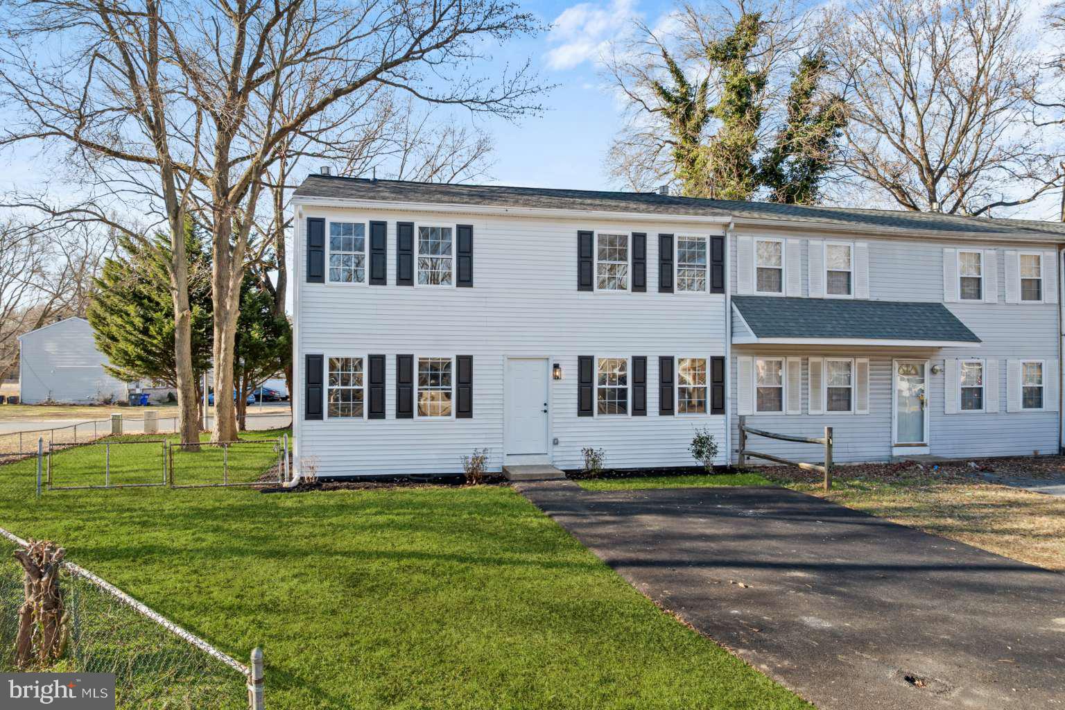 WOW... this is the one you've been waiting for! Welcome to an absolutely stunning, move-in-ready end-unit townhouse that truly has it all. This home offers a pure luxury look with finishes rarely found at this price point. Featuring 4 bedrooms, 1.5 bathrooms, every detail has been thoughtfully updated. Step inside and fall in love immediately. The main level boasts a welcoming foyer, spacious dining room, a beautifully renovated kitchen with breakfast area, inviting living room, convenient half bath, and laundry room. Upstairs, you'll find four generously sized bedrooms and a fully updated full bathroom. Outside, enjoy a large backyard, a nicely sized driveway, and excellent curb appeal that sets this home apart. Major upgrades include a brand-new kitchen, new bathrooms, new flooring, new doors, new roof, upgraded HVAC, new driveway, and so much more. Finding a home of this size, condition, location, and price is truly rare. This one will not last.