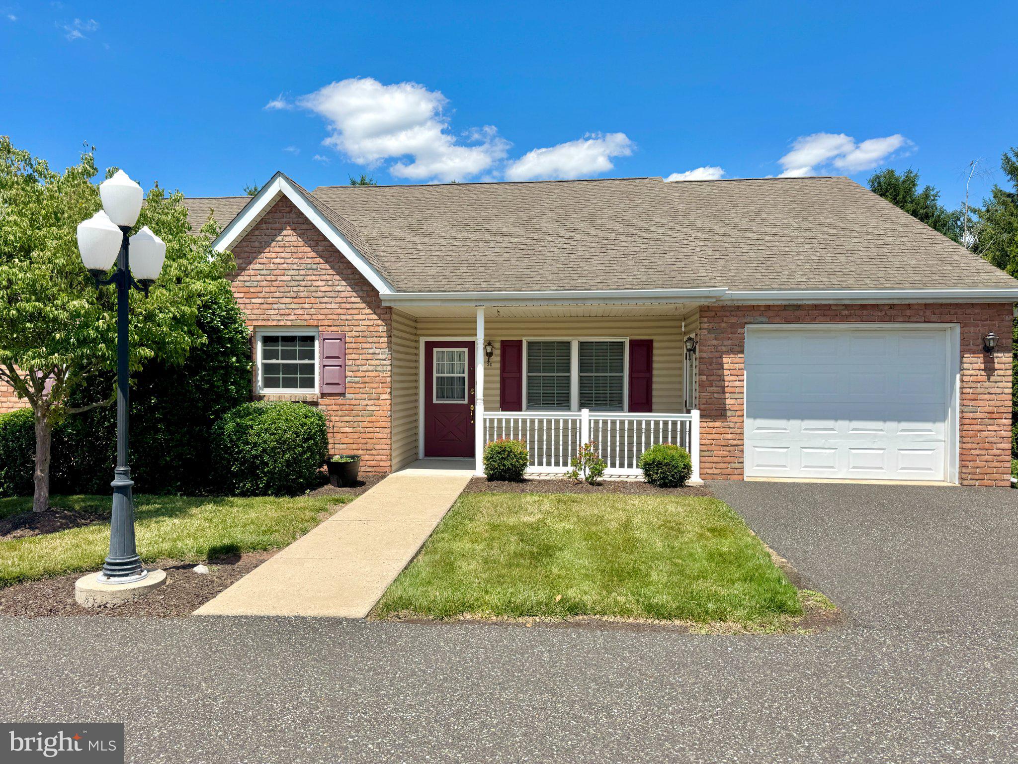 Carefree, Maintenance-Free Living at Buchert Ridge 55+ Community! Welcome to the Highland III, a beautifully designed 3-bedroom, 2-bathroom cottage offering approximately 1,410 square feet of bright, open living space, plus the added convenience of an attached one-car garage. Perfect for anyone seeking an independent, active lifestyle, this pet-friendly 55+ community specializes in freeing you from the mundane chores of traditional homeownership. Step from your charming front porch into an inviting, open-concept living area and dedicated dining room. The fully equipped kitchen features an included appliance package with a refrigerator, stove, microwave, and dishwasher. Premium updated options featured in this model include modern flooring, upgraded lighting and hardware, elegant Corian countertops, and a stylish tile backsplash. The spacious layout includes a master suite with an attached master bath and walk-in closet, two additional comfortable bedrooms, a full second bathroom, and a dedicated laundry room equipped with a washer and dryer. Enjoy comfortable, efficient year-round climate control via forced air natural gas heat and central AC. At the rear, a private patio is the perfect spot for morning coffee or relaxing evening sunsets. This is an independent living community placement. Rather than traditional real estate financing, this community operates on an affordable Entry Fee structure of $285,800, which offers peace of mind with a 75% refund guaranteed back at resale. Say goodbye to unpredictable monthly expenses! Your comprehensive Monthly Maintenance & Service Fee covers nearly everything, ensuring a predictable, stress-free budget. Both property and school taxes are included, along with 24/7 on-call maintenance handling all interior, exterior, and appliance repairs. Professional landscaping, lawn care, snow removal, water, sewer, trash/recycling, and master property insurance are all covered as well. The monthly fee is $2,000.00 for one resident or $2,298.75 for two residents, and the fee ends immediately when the home is returned for resale.Discover a vibrant environment "where neighbors feel like family." Schedule your tour today to explore this unique layout and see all the various models available in the community! 
***Please note that the photos provided feature the interior of the model home and a more recently updated unit to demonstrate the beautiful possibilities of what this space could look like***