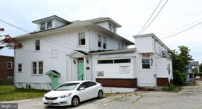 SALE IS CONTINGENT UPON COMPLETION OF A SUBDIVISION.

This approximately 3,471 SF primary building sits on roughly 8,400 SF of BL-zoned property and offers a diverse mixed-use investment opportunity with a total of six potential tenant spaces.

The upper level features a leased two-bedroom residential apartment providing stable rental income. The main level consists of three commercial spaces, including a leased diabetic supply store and a retail showroom currently offering furniture, electronics, bedding, and related merchandise. Two additional basement-level spaces remain in shell condition, presenting value-add potential for future buildout and increased income generation.

Also available for purchase is the adjacent secondary building, an approximately 454 SF standalone structure currently leased and operating as a deli/convenience store.

Both buildings have undergone extensive renovations, with the exception of the unfinished basement spaces. Improvements include new electrical systems, HVAC, plumbing, walls, flooring, lighting, and more.

Purchase the primary building individually or capitalize on the opportunity to acquire both properties together. Strong income potential with an attractive cap rate and upside through lease-up and future improvements.
