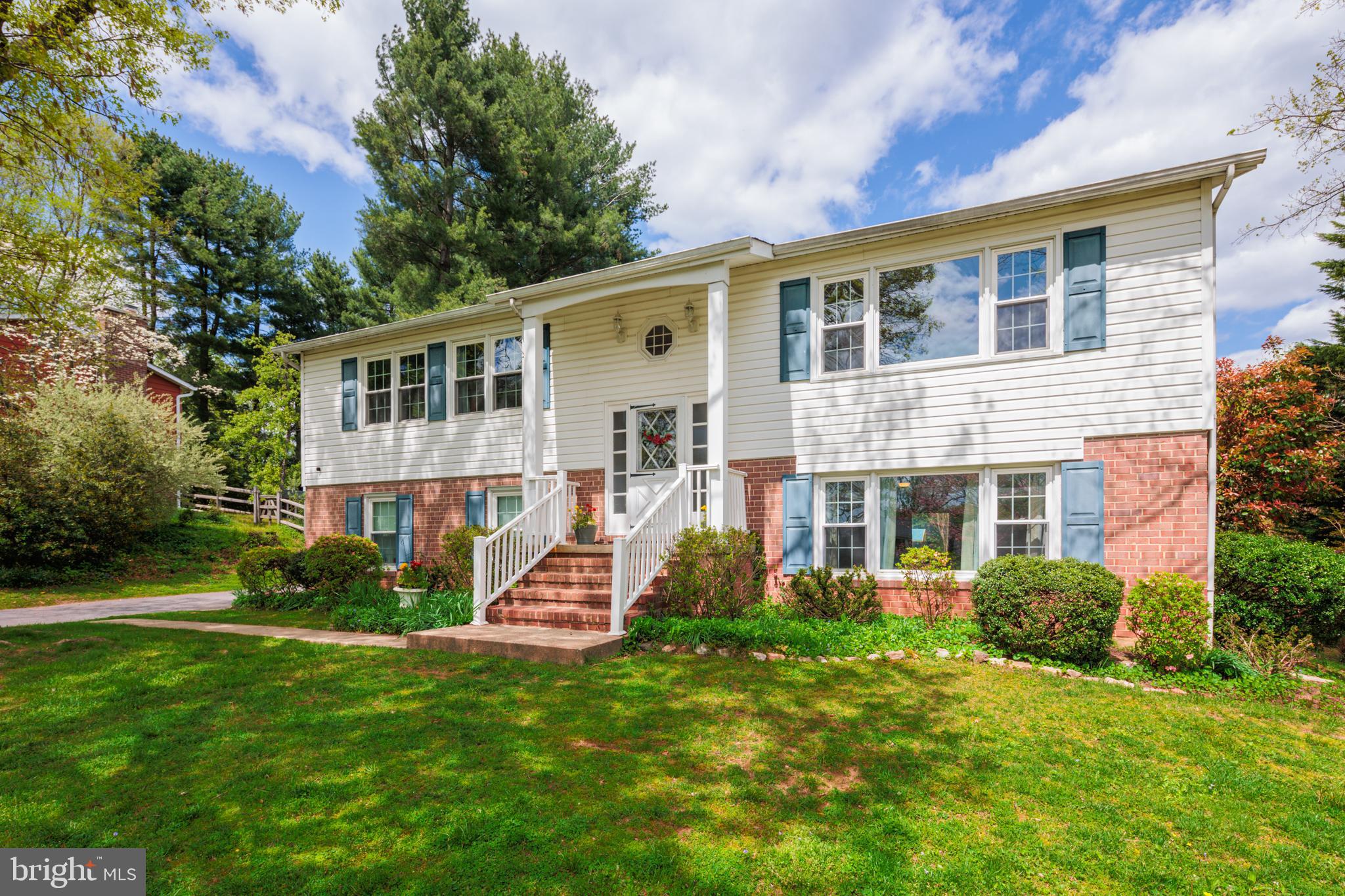 You won’t want to miss this charming split level home in highly sought after Ellicott City! This home boasts 4 true bedrooms, 2.5 baths and lots of updates throughout. The fully updated kitchen has granite counters, stainless steel appliances, and plenty of storage.  It also has a breakfast bar that opens up to the dining room. The large living room is light-filled and has great views of the huge front yard. The main level wood floors have all been refinished and the house is freshly painted. The main level has a fully renovated hall bath, 2 sizable bedrooms, and a primary bedroom with an en-suite. The lower level has a large, light filled family room (with a wood burning fireplace) along with a bedroom/office, complete with custom barn doors. One car garage access off of the lower level and a large storage/laundry room with a half bath. There is additional storage space in the attic. The backyard is full of possibilities as it’s flat and beautifully landscaped! Super convenient location...close to shopping, schools, and highways!