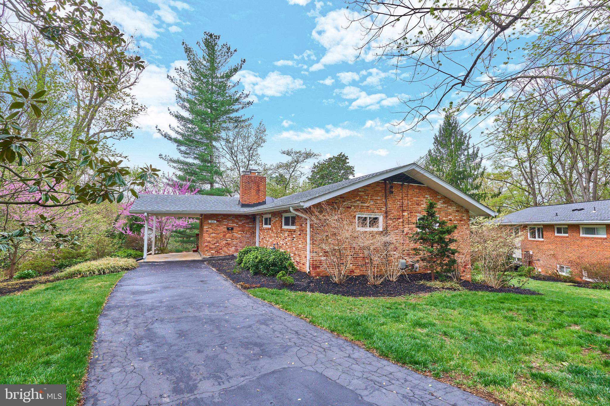 Stylishly refreshed mid-century patio home in a parklike neighborhood is not to be missed!  Welcome to the sought-after Dowden Terrace neighborhood, in West Alexandria!  Come and be surrounded by nature, within 10 miles of the Nation’s Capitol.   4 bedrooms, 2 full bathrooms, 2 finished levels, 2-tier deck, gleaming hardwood floors, open concept Kitchen, floor-to-ceiling windows on both levels, carport parking, and a lushly landscaped property is exactly what you’ve been waiting for!   3 Bedrooms and 1 bathroom on the main level; 4th Bedroom and 1 full shower stall Bathroom on the lower level.    NEW interior refreshes completed April 2025, include freshly painted walls throughout with serene Sherwin Williams, “Drift of Mist”, and jazzy Behr, “Navy Blue” Merillat-Brand painted cabinets in Kitchen and Bathroom, new light fixtures throughout, brand new carpeting and laminate flooring in on-trend colors throughout, refreshed Full Bathrooms with stylish black accessories - it’s all here for today’s buyers.   
 Kitchen updates include: deep inset stainless steel sink, gold-toned pull-down faucet, multi-speed range hood fan, on-trend gold-toned cabinet hardware, and stunning quartz countertops with extended bar seating space making for an inviting space for cooking and entertaining.   Main Level open concept Kitchen-Dining Room into Living Room layout just begs for hosting family and friends or a quiet afternoon watching nature outside.   Gleaming original hardwood floors on the main level and floor-to-ceiling windows throughout create light and bright rooms and plenty of tree views!  3 Spacious Bedrooms on the main level each have hardwood floors, overhead lights and spacious closets.   2 Full Bathrooms each have updated vanities, light fixtures, black accessories and framed mirrors, and laminate flooring.   Solid brick walls with 2 wood-burning masonry fireplaces are the perfect urban detail that lends itself to that mid-century vibe and cozy mood.  A large recently painted 2-tier Deck off the Living Room and Rec Room is perfect for that respite from the day’s hectic events -  Imagine sitting out on your rear Deck enjoying nature all around.   Fully finished Rec Room and extended Flex Space with original knotty pine hardwood paneling gives this level a cool vintage 60’s vibe!  Rec Room has a wood-burning masonry fireplace and exterior door to exit to the expansive lower deck area and pergola area with access to the rear yard and shed.  Laundry Room and expansive Utility Storage Room complete the lower level.  1-car carport and long driveway provides off-street parking options.  The beautifully landscaped large lot is partially fenced and has an in-ground Rainbird sprinkler system.   HVAC 2024, Roof 2023, Windows 2015, with current stainless steel appliances in the Kitchen. NO HOA.   Marketing brochure, floor plans, MLS Disclosures, and Offer Guidelines are online documents.   Seller reserves the right to set an offer deadline and accept an offer outside of the deadline.  The listing agent lives in the neighborhood and can speak with the many amenities that make Dowden Terrace such a special place to live!   Be ready to make this your next home in time for the spring and summer seasons!