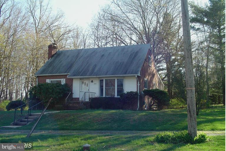 Quaint three bedroom two bath cape cod in the heart of Harford great location boasting a wooded lot. The den on main level could be a third bedroom Hardwood floors central air covered deck with screening,  partially finished lower level with fireplace Large eat-in kitchen with all appliances