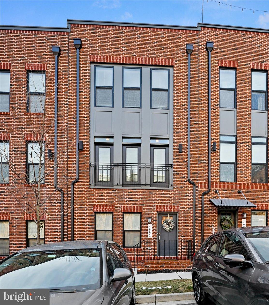 Welcome to 4003 Harmony Ct. This almost new luxury townhome built in 2020 offers a 2 car garage, 3 spacious bedrooms, 3 full bathrooms, 1 half bathroom, and a loft on the 4th level that leads out to 2 rooftop decks with gorgeous city views. The main level features an open layout with gourmet kitchen, large island, upgraded quartz countertops, stainless steel appliances, and soft-close cabinetry. The upper level consists of 2 large bedrooms, each with their own full bathroom, and a laundry room in the hall. Enjoy entertaining in your loft that features its own upgraded wet bar with quartz countertops and an under counter refrigerator. Walk out to one of two rooftop decks and relax while taking in the city views. Enjoy living in your new luxury townhome community, which is conveniently located just blocks from the harbor, restaurants, and retail shops. You do not want to miss out on this one! Come take a look today.