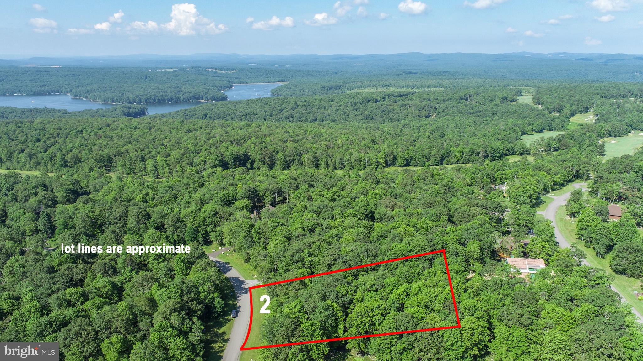 A clean .71-acre building lot in Sandy Shores Heights—level, partially wooded, with utilities to site. Minutes from Lodestone, Wisp, and Deep Creek Lake… this property sits in a quiet golf side loop with mountain views and paved access. Water and sewer taps included. Road maintenance and snow removal covered by HOA fees. Call today for details!